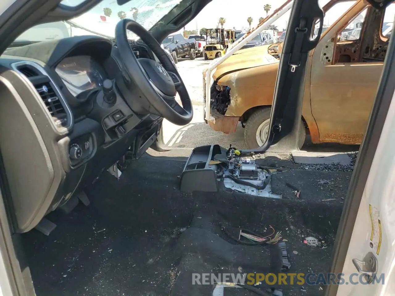 7 Photograph of a damaged car 3C6UR5DJ2RG373340 RAM 2500 2024