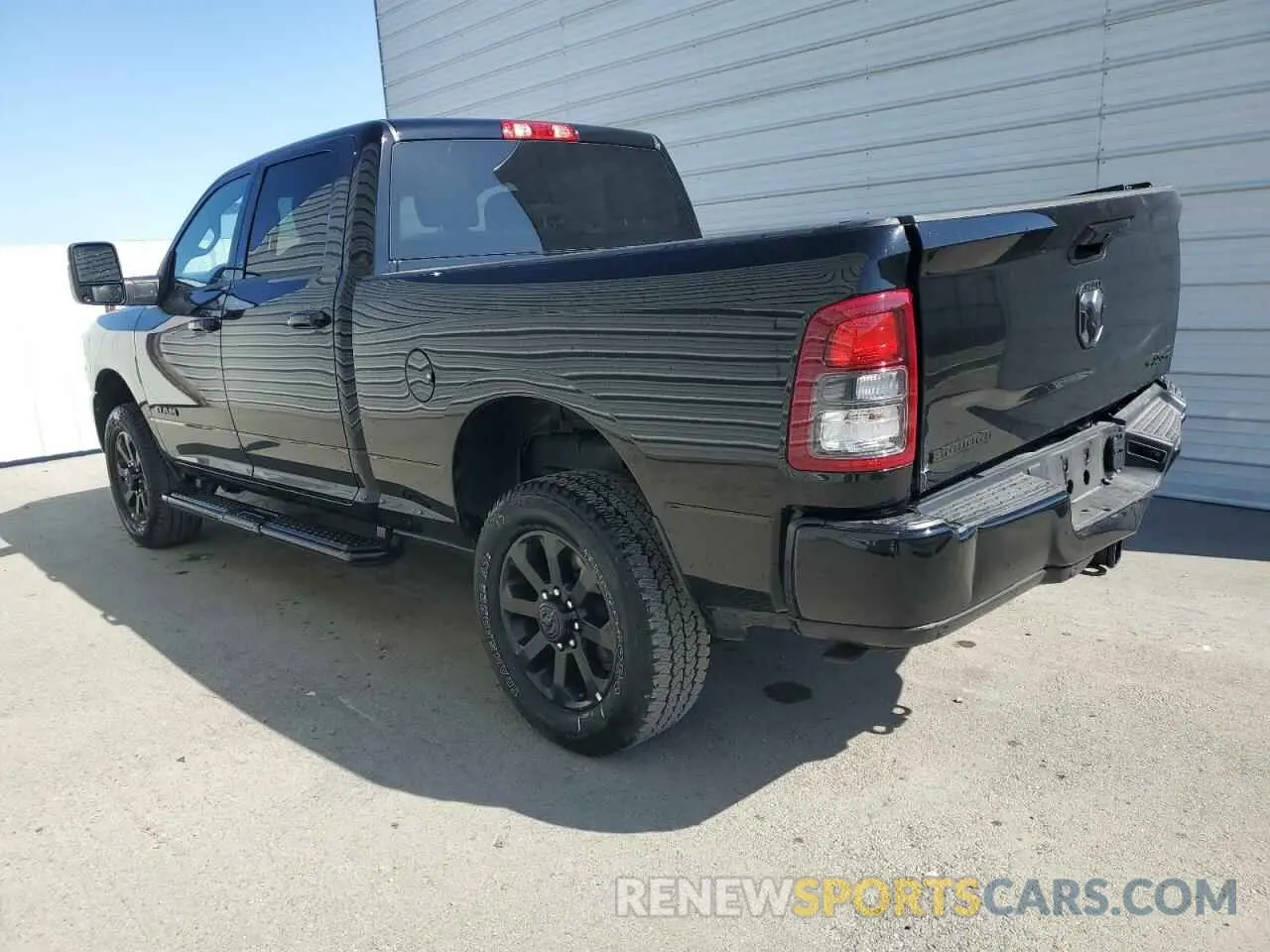 2 Photograph of a damaged car 3C6UR5DJ2RG383222 RAM 2500 2024