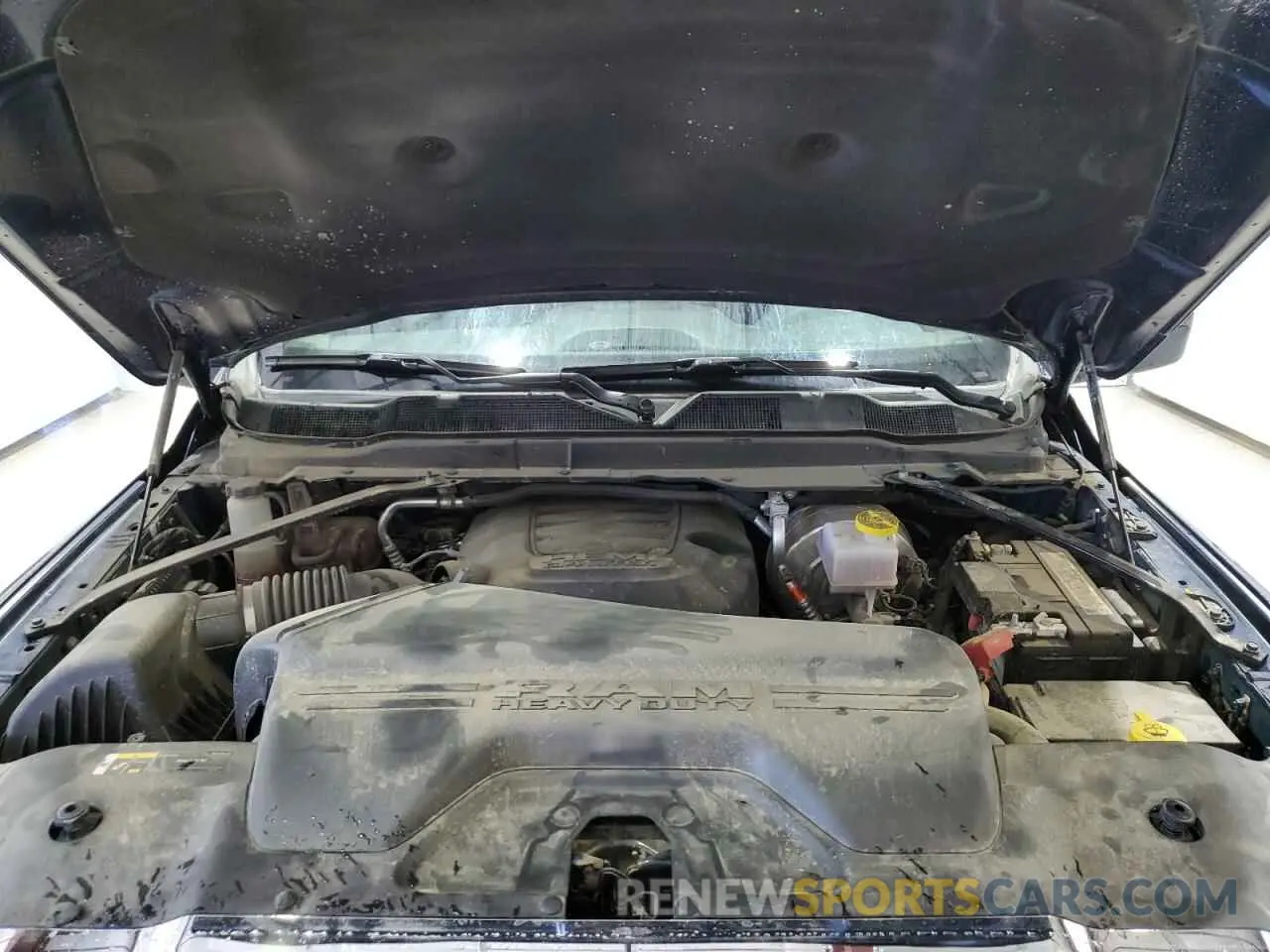 11 Photograph of a damaged car 3C6UR5DJ2RG405820 RAM 2500 2024