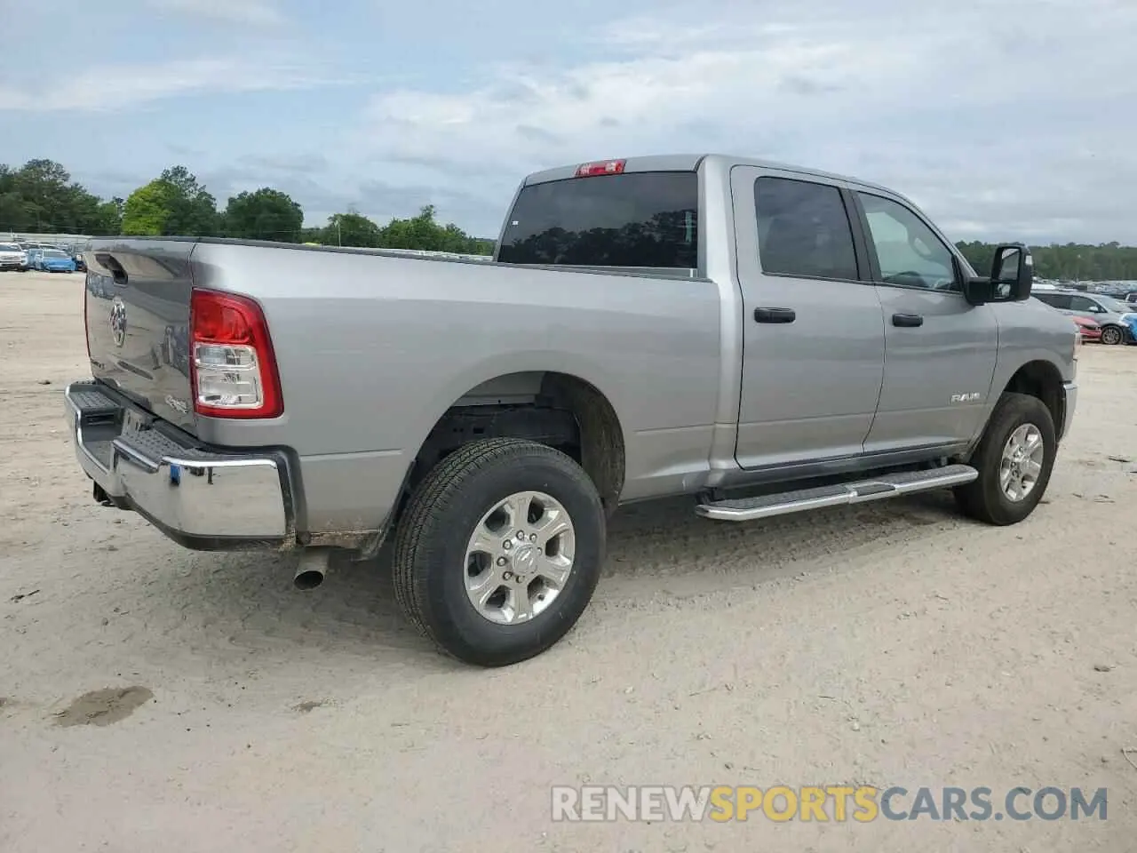 3 Photograph of a damaged car 3C6UR5DJ2RG406045 RAM 2500 2024