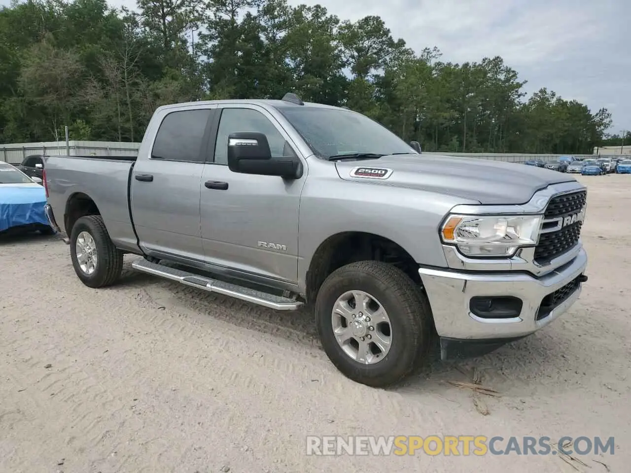 4 Photograph of a damaged car 3C6UR5DJ2RG406045 RAM 2500 2024