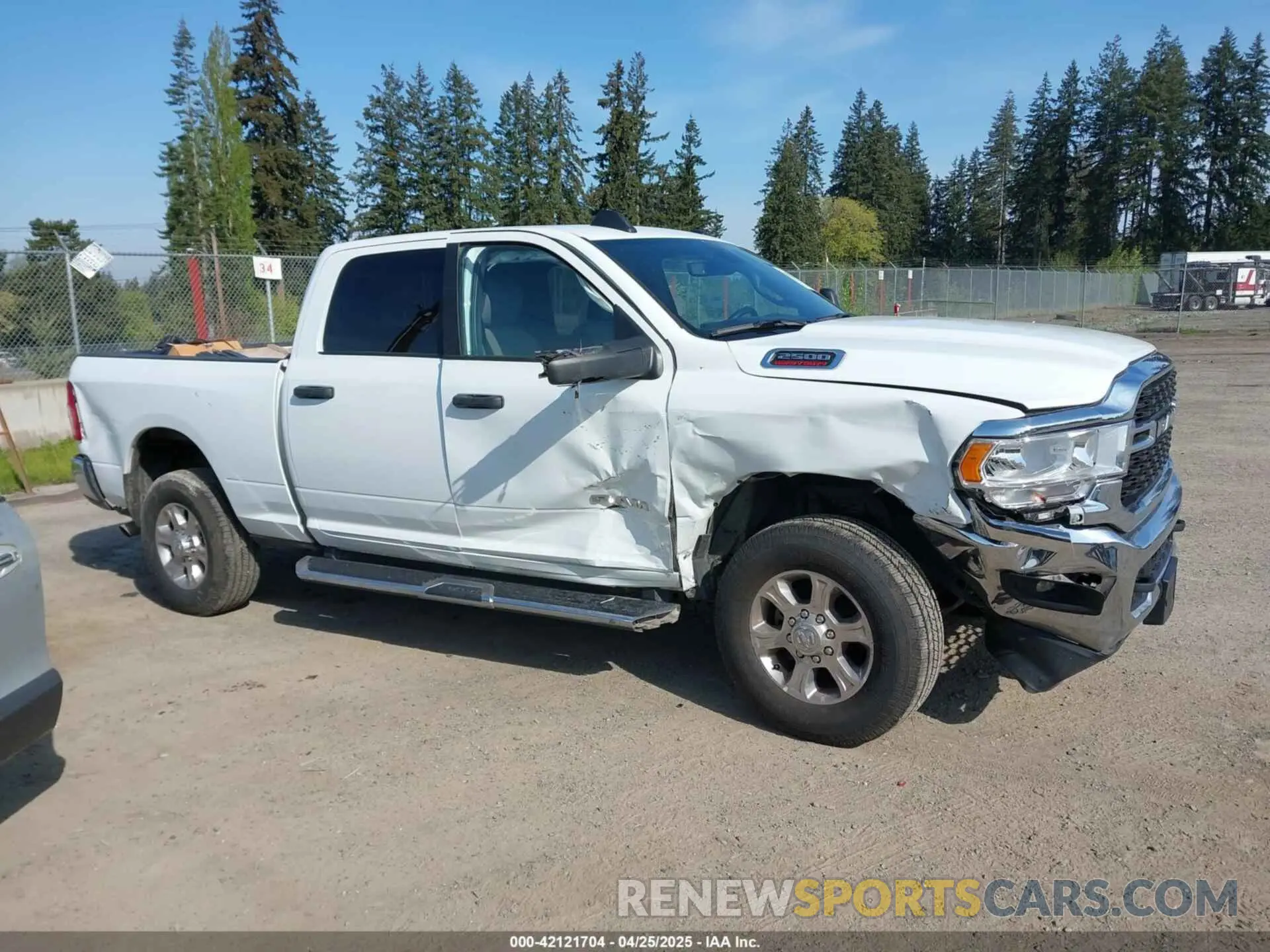 13 Photograph of a damaged car 3C6UR5DJ3RG275904 RAM 2500 2024