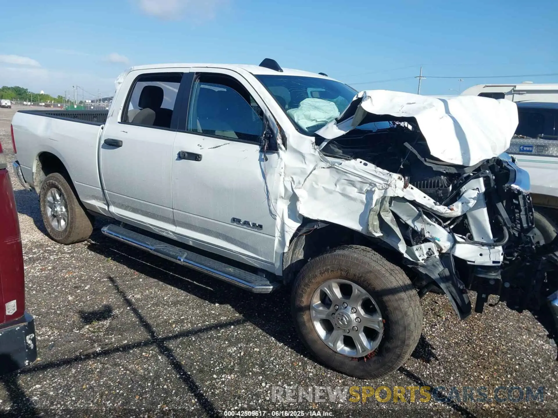 1 Photograph of a damaged car 3C6UR5DJ3RG366512 RAM 2500 2024