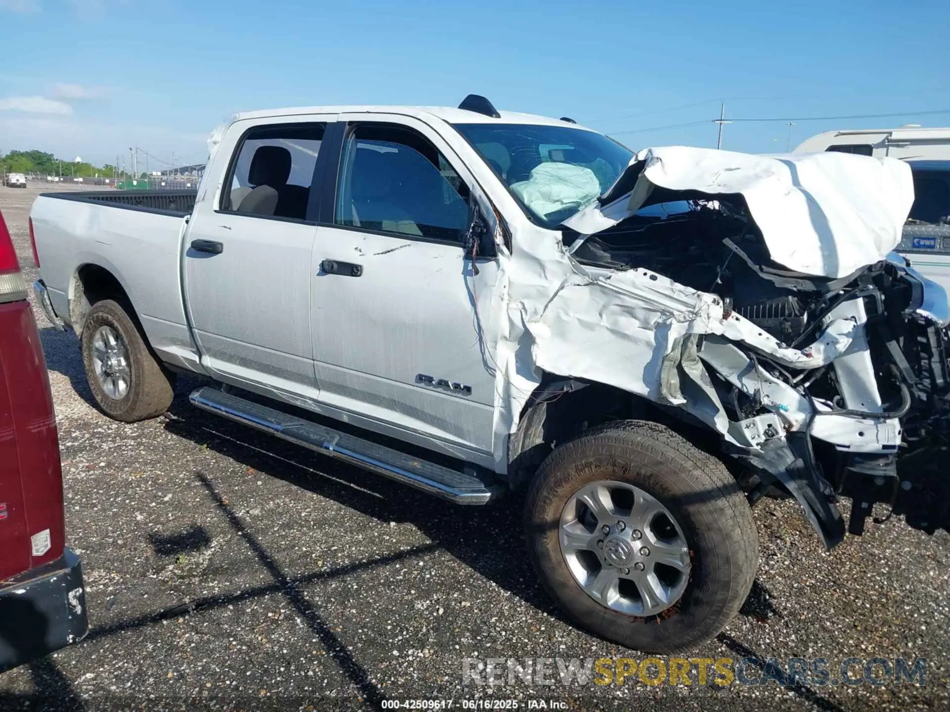 13 Photograph of a damaged car 3C6UR5DJ3RG366512 RAM 2500 2024