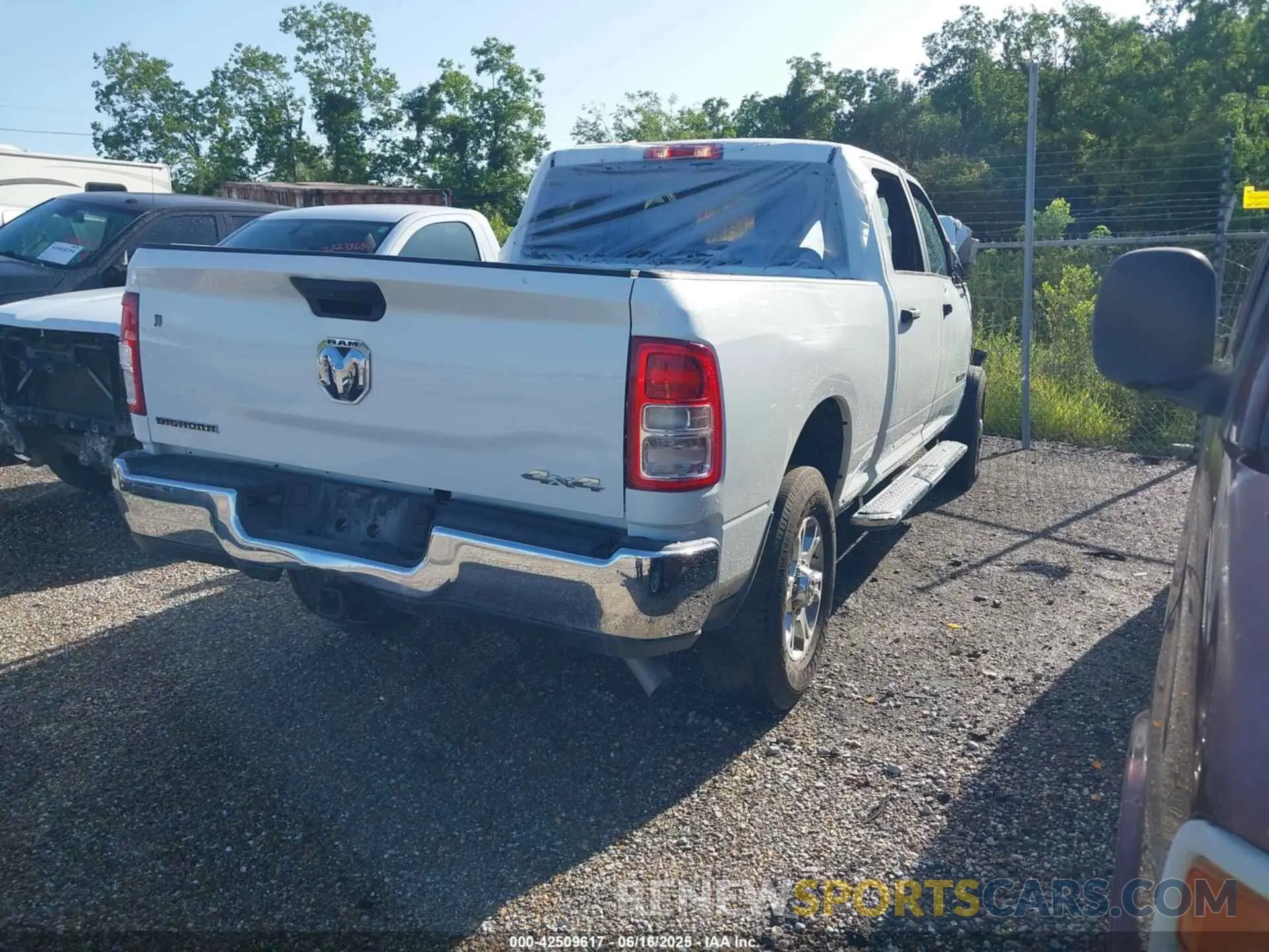 4 Photograph of a damaged car 3C6UR5DJ3RG366512 RAM 2500 2024