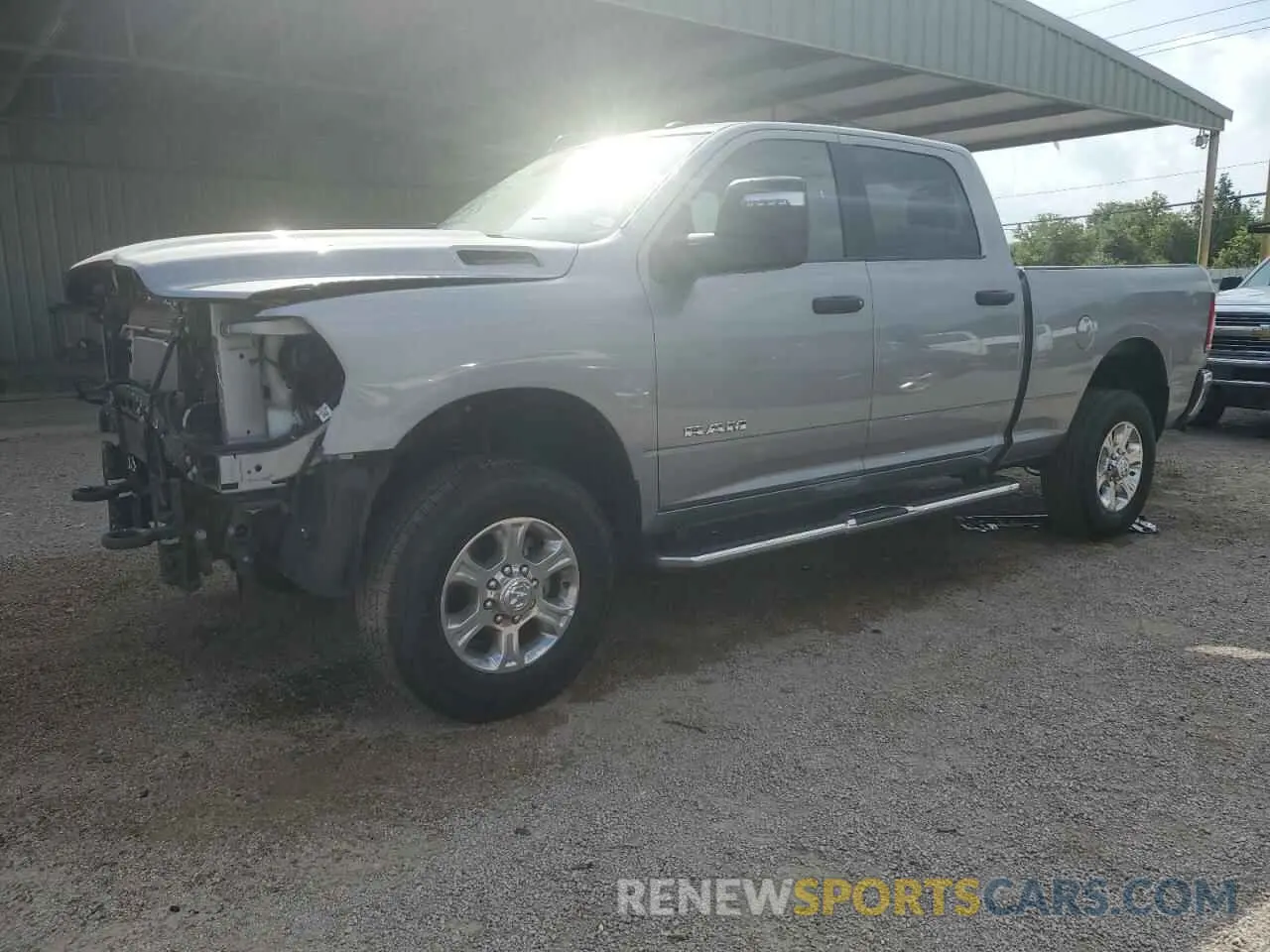 1 Photograph of a damaged car 3C6UR5DJ3RG406510 RAM 2500 2024