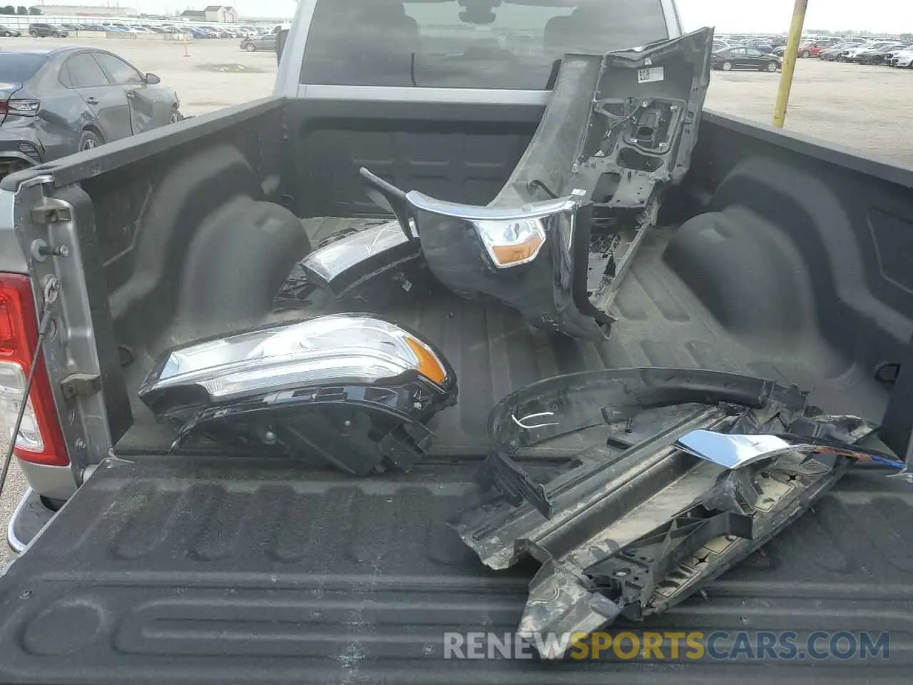12 Photograph of a damaged car 3C6UR5DJ3RG406510 RAM 2500 2024