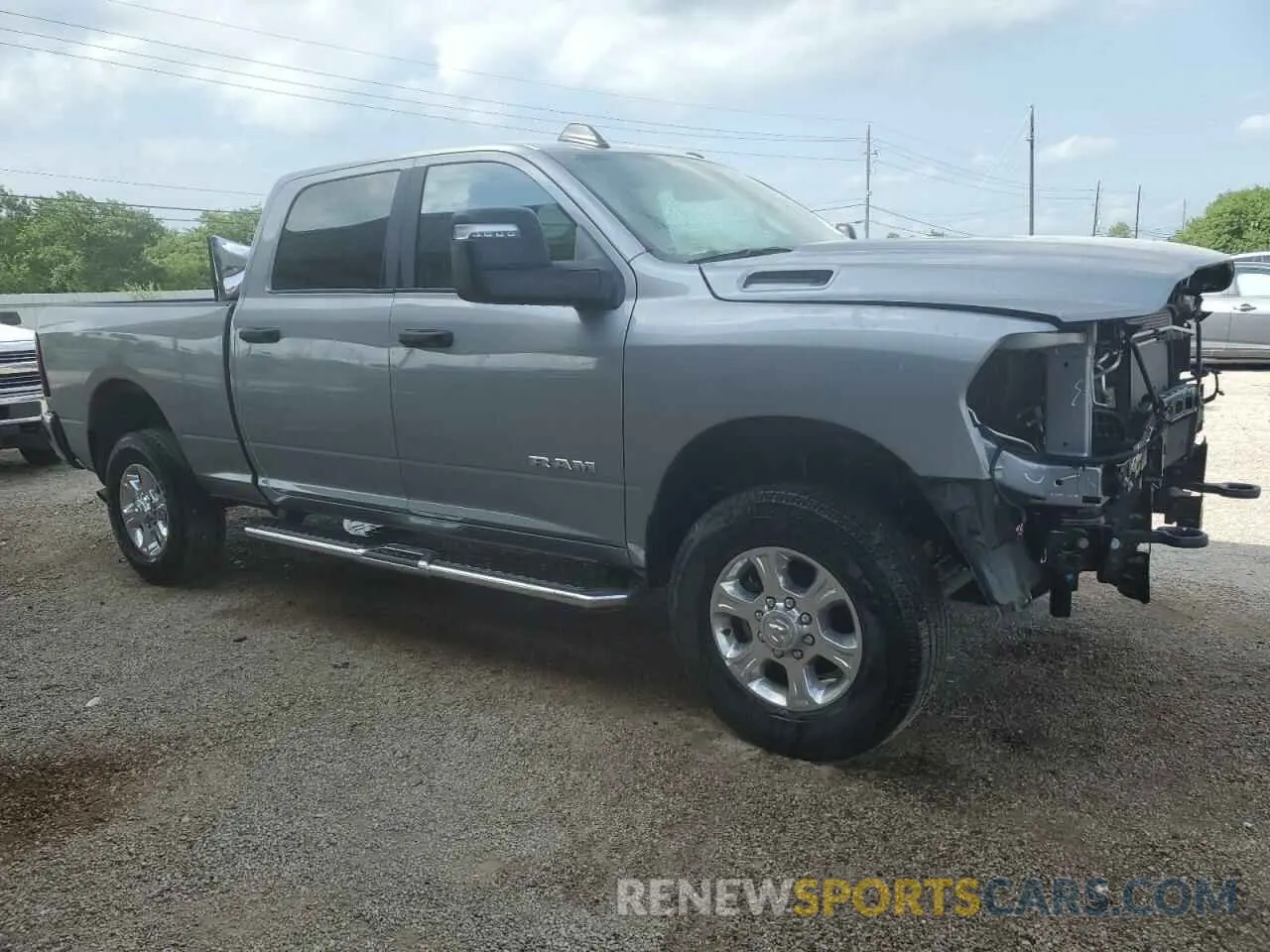 4 Photograph of a damaged car 3C6UR5DJ3RG406510 RAM 2500 2024