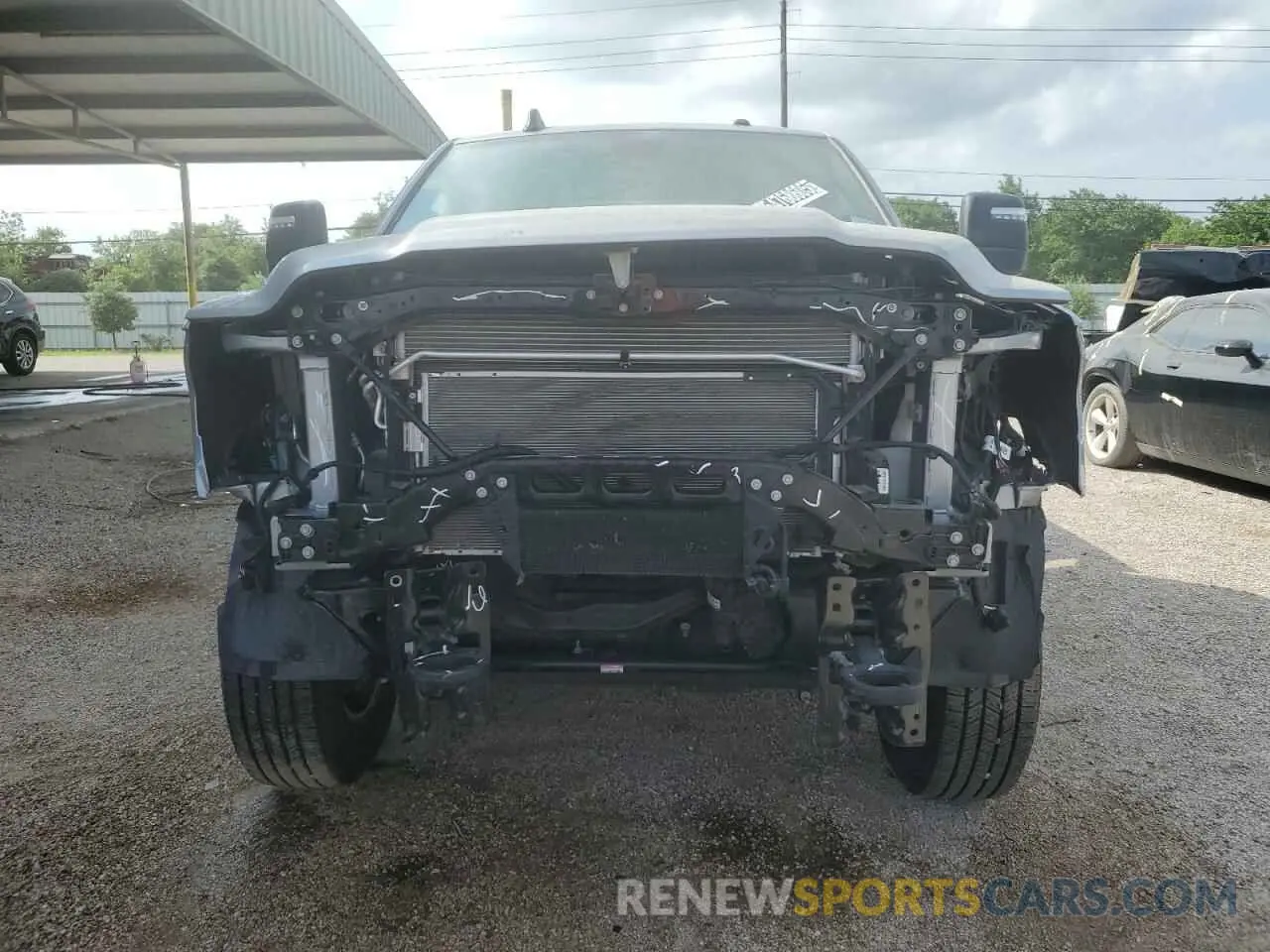 5 Photograph of a damaged car 3C6UR5DJ3RG406510 RAM 2500 2024