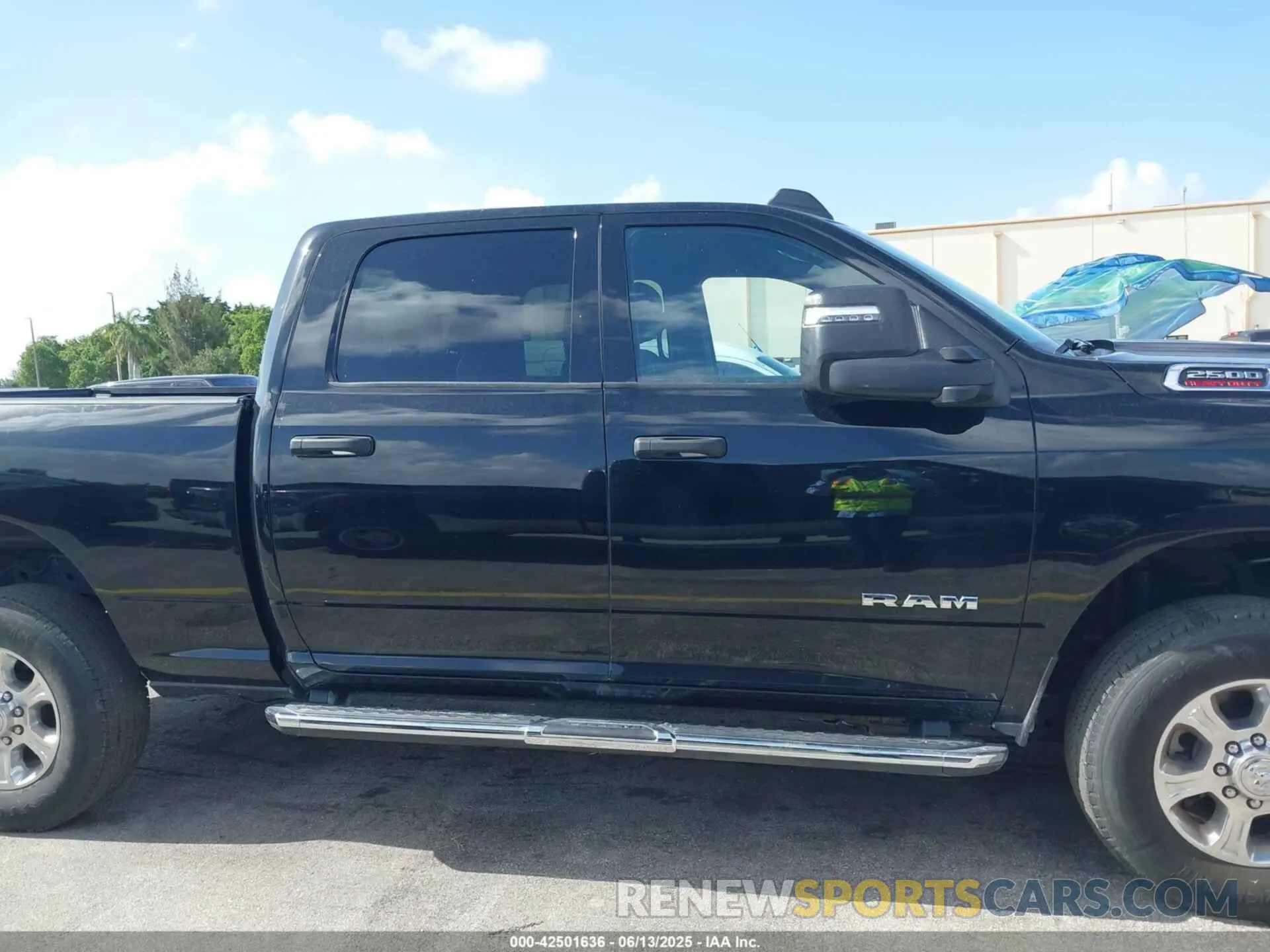 13 Photograph of a damaged car 3C6UR5DJ4RG311227 RAM 2500 2024