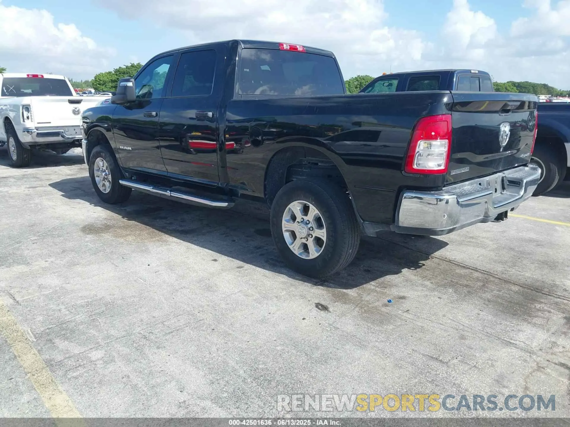 3 Photograph of a damaged car 3C6UR5DJ4RG311227 RAM 2500 2024