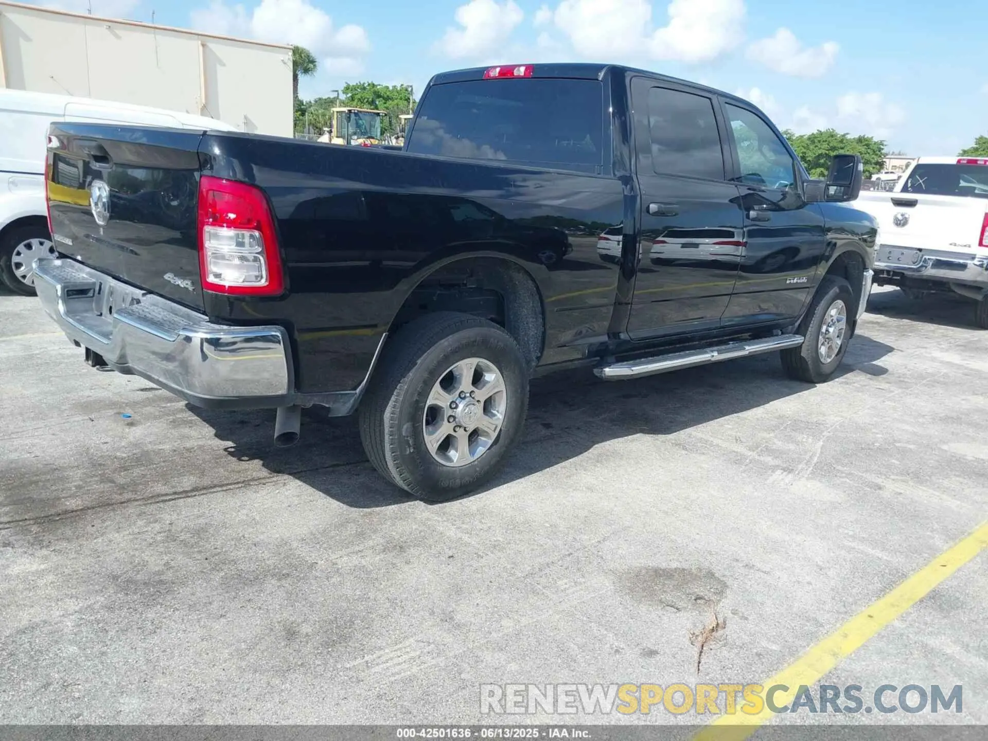 4 Photograph of a damaged car 3C6UR5DJ4RG311227 RAM 2500 2024