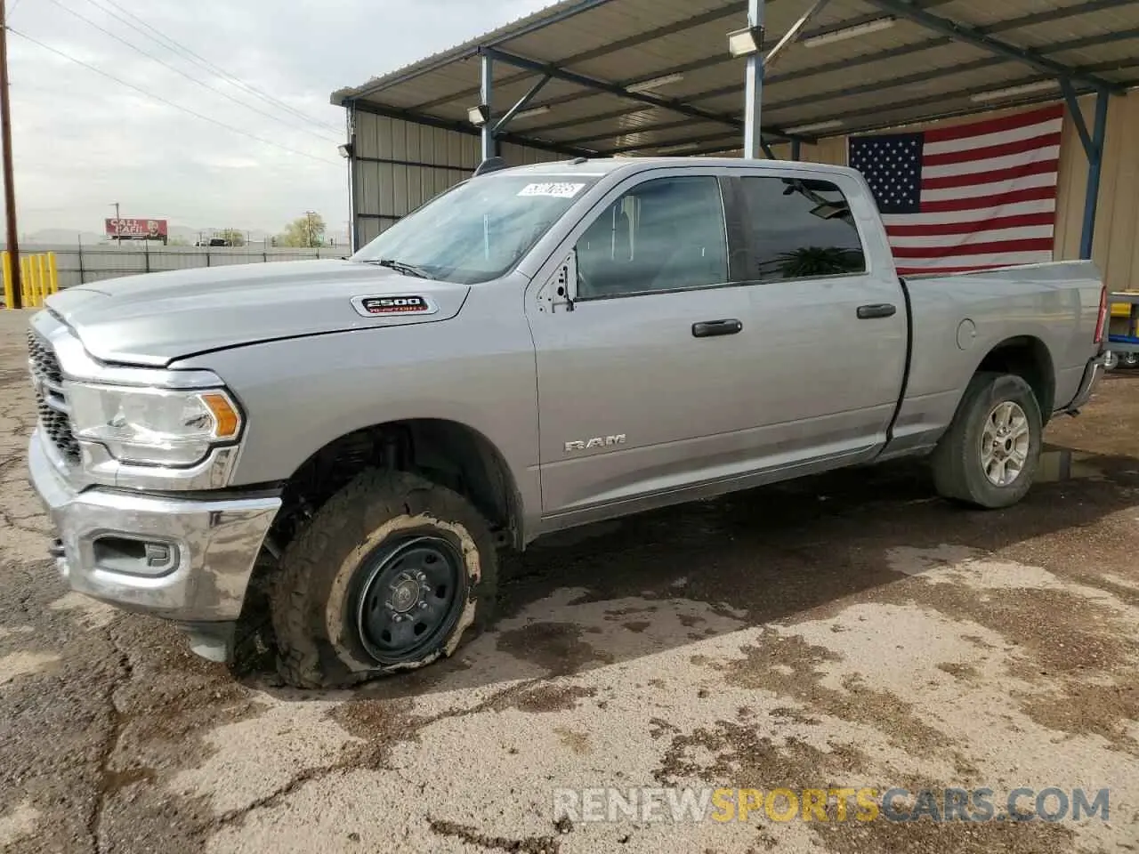 1 Photograph of a damaged car 3C6UR5DJ4RG323264 RAM 2500 2024