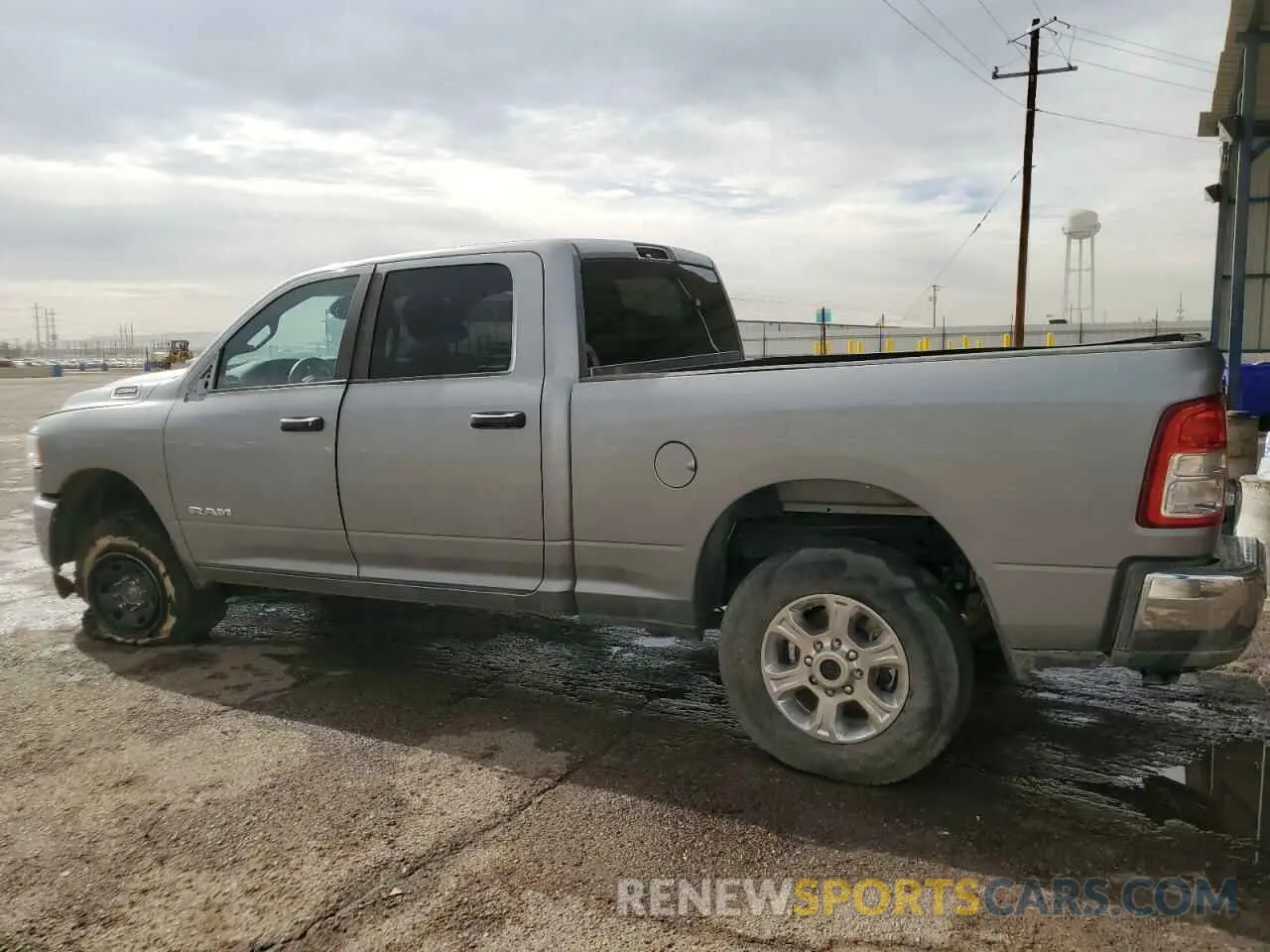 2 Photograph of a damaged car 3C6UR5DJ4RG323264 RAM 2500 2024