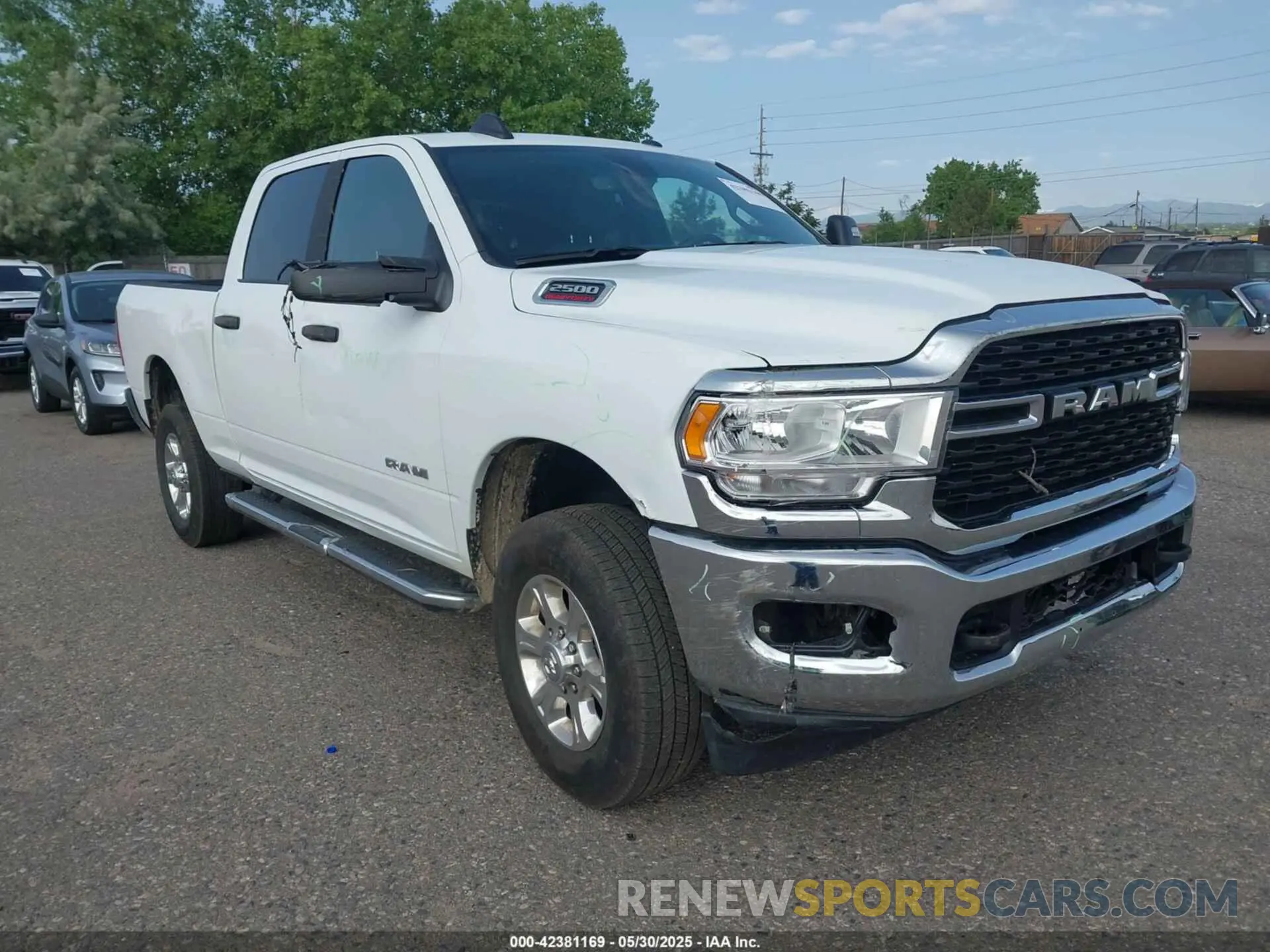 1 Photograph of a damaged car 3C6UR5DJ4RG364817 RAM 2500 2024