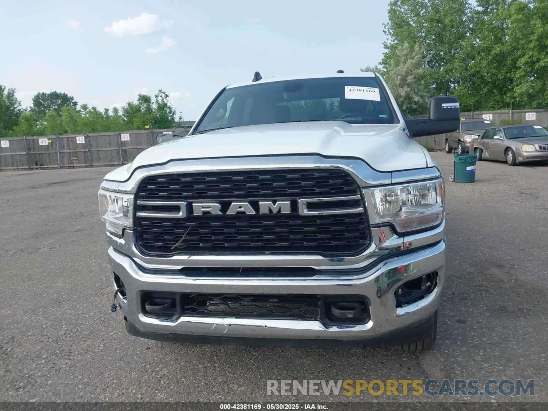 12 Photograph of a damaged car 3C6UR5DJ4RG364817 RAM 2500 2024