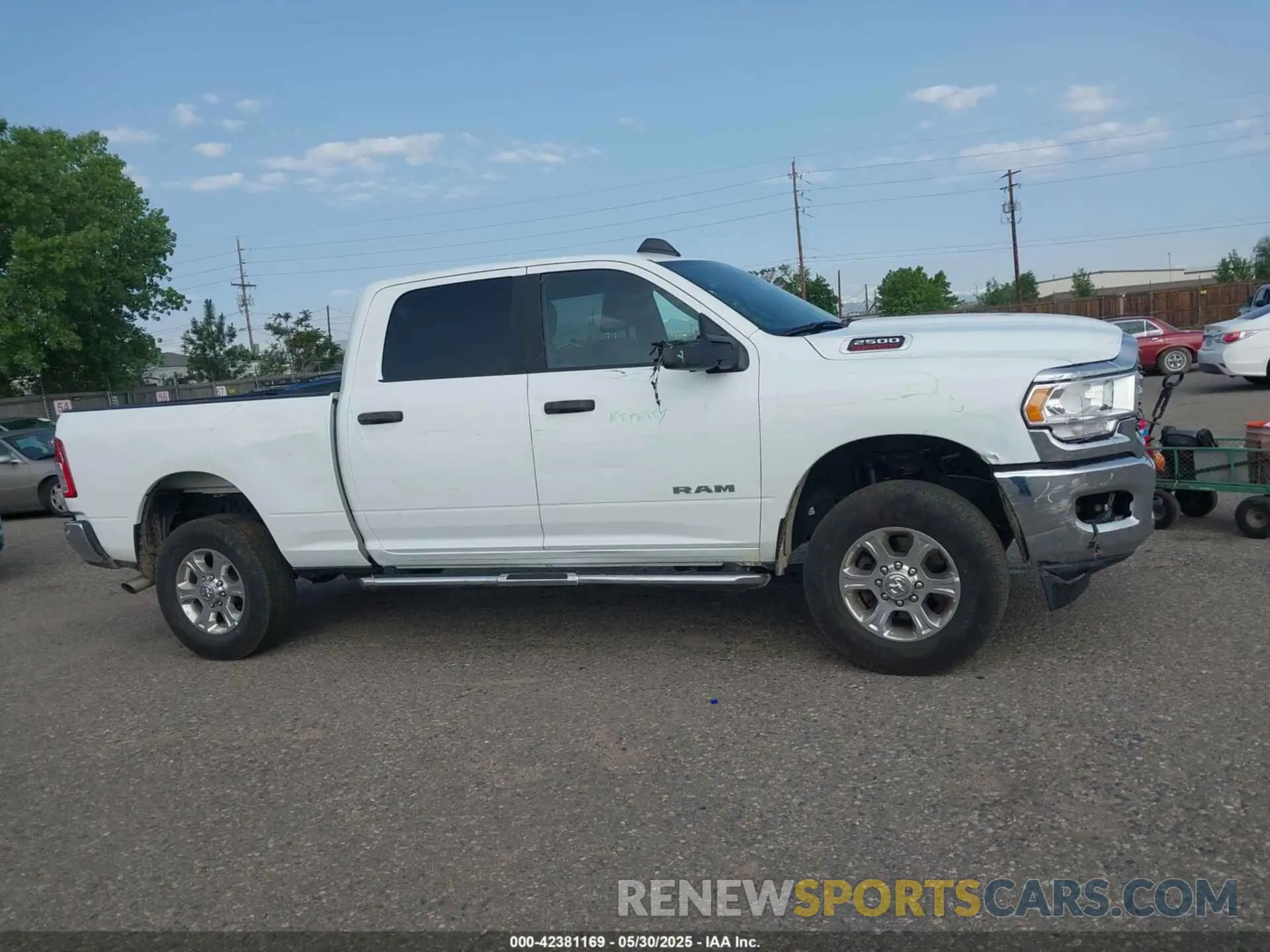 13 Photograph of a damaged car 3C6UR5DJ4RG364817 RAM 2500 2024