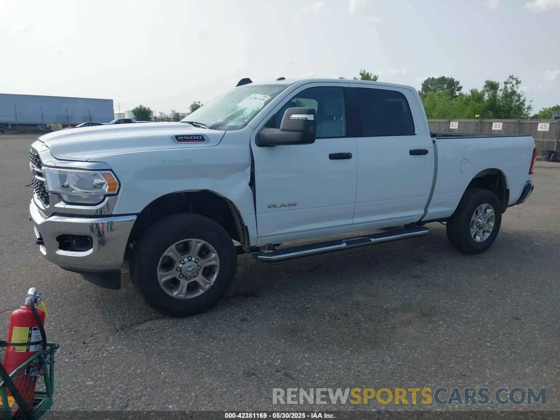 2 Photograph of a damaged car 3C6UR5DJ4RG364817 RAM 2500 2024