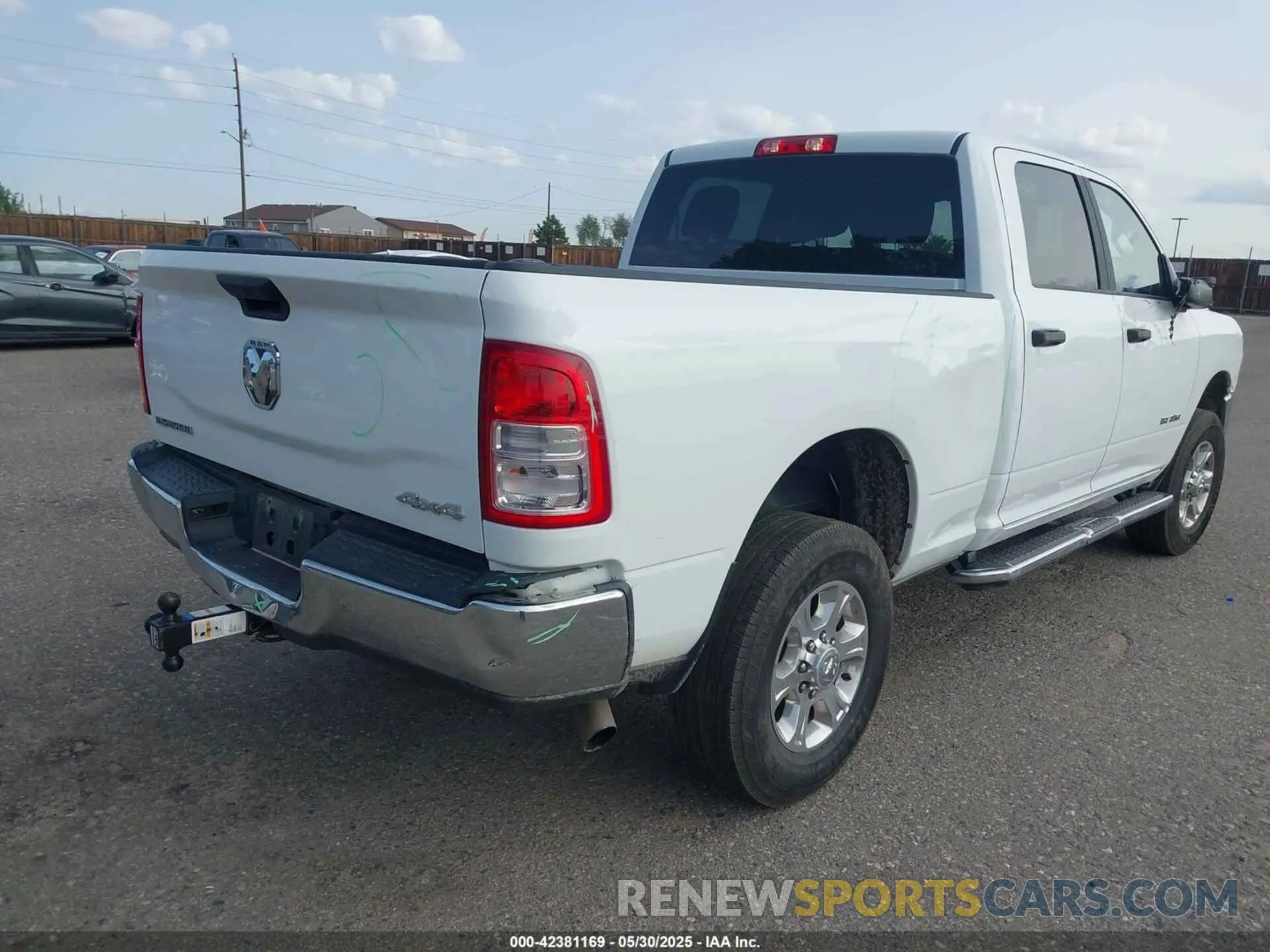 4 Photograph of a damaged car 3C6UR5DJ4RG364817 RAM 2500 2024