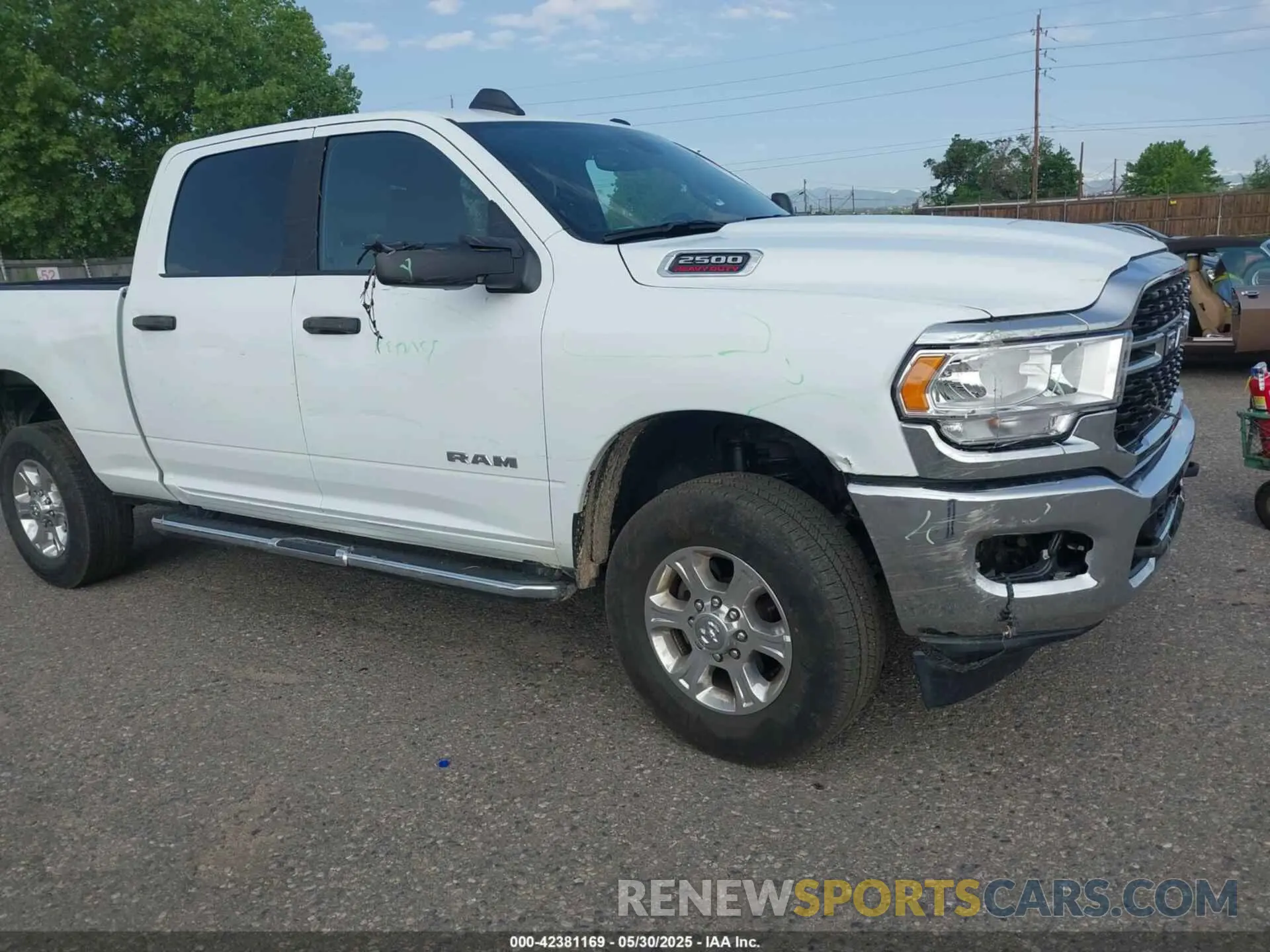 6 Photograph of a damaged car 3C6UR5DJ4RG364817 RAM 2500 2024