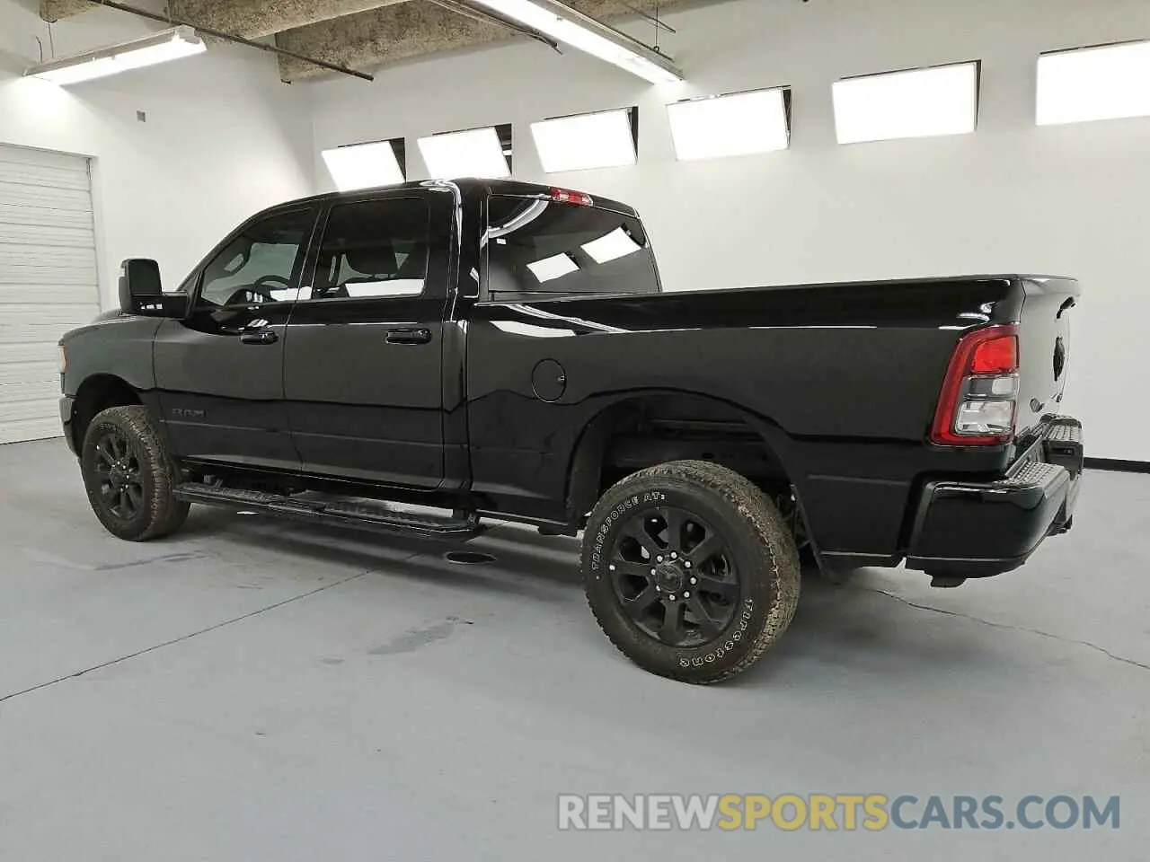 2 Photograph of a damaged car 3C6UR5DJ4RG387269 RAM 2500 2024