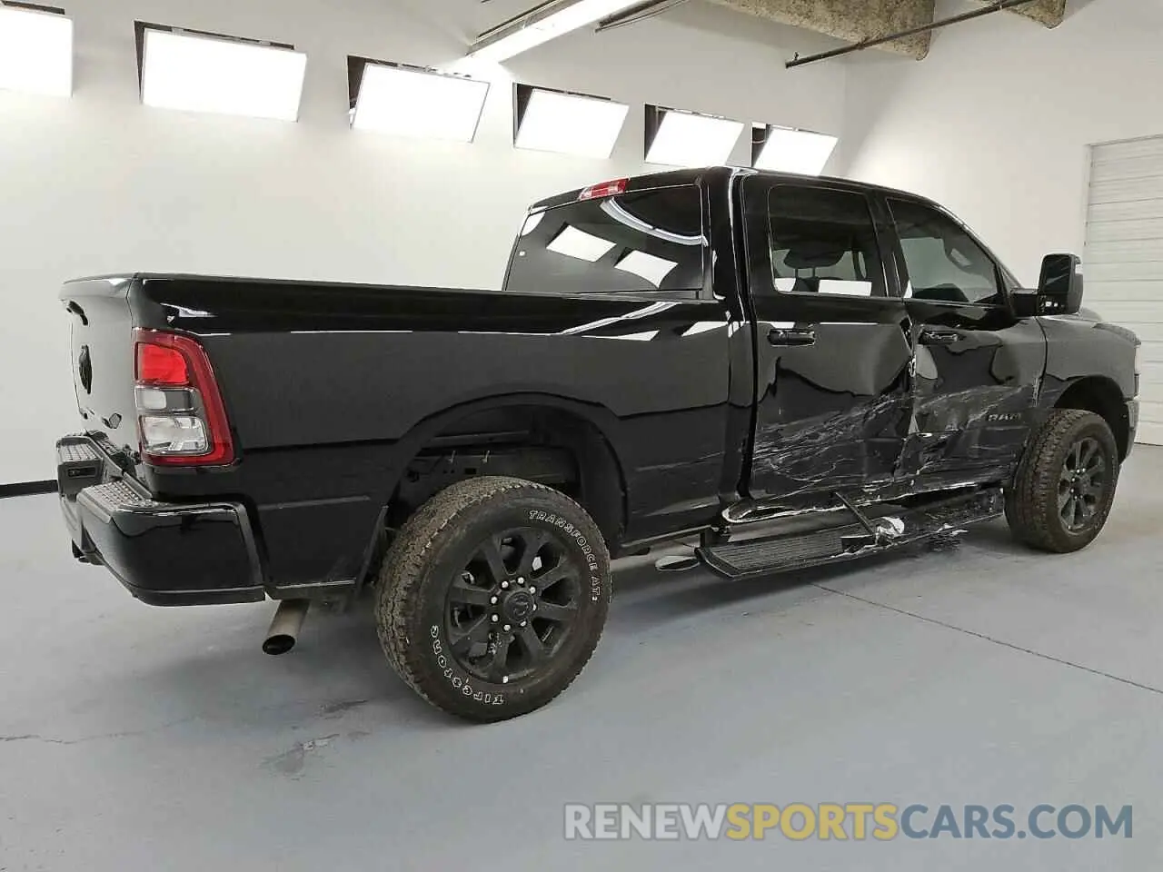 3 Photograph of a damaged car 3C6UR5DJ4RG387269 RAM 2500 2024