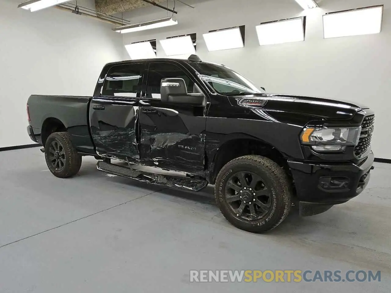 4 Photograph of a damaged car 3C6UR5DJ4RG387269 RAM 2500 2024
