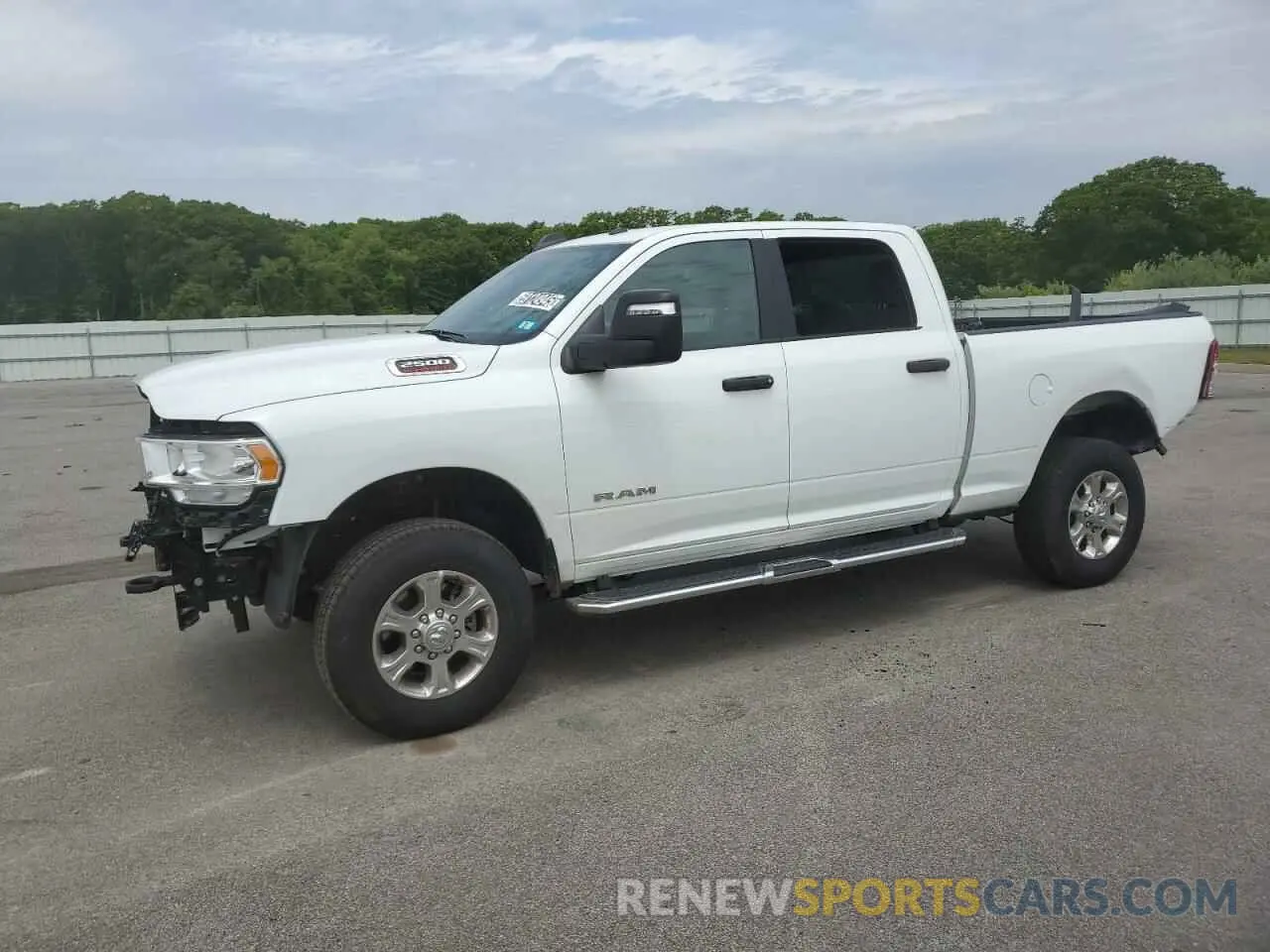 1 Photograph of a damaged car 3C6UR5DJ5RG373879 RAM 2500 2024