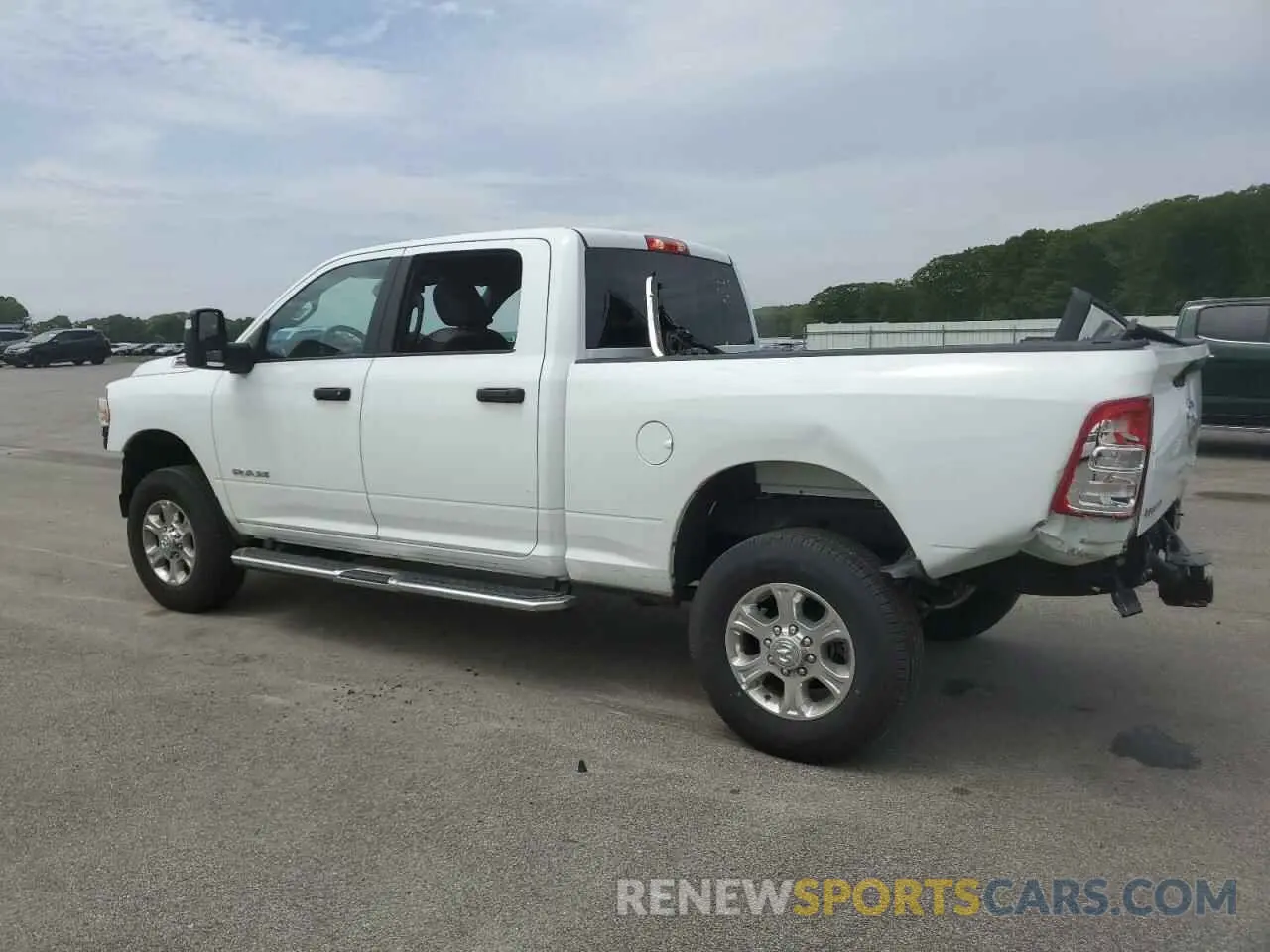 2 Photograph of a damaged car 3C6UR5DJ5RG373879 RAM 2500 2024