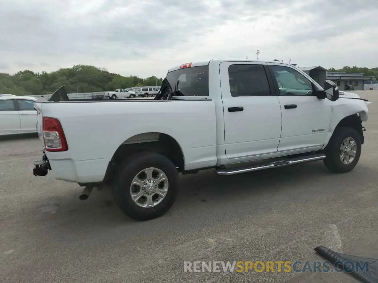 3 Photograph of a damaged car 3C6UR5DJ5RG373879 RAM 2500 2024