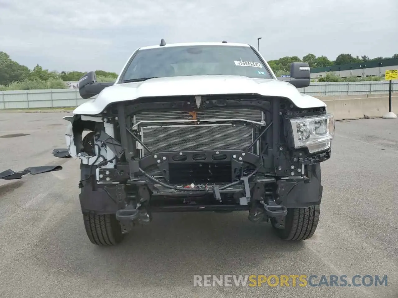 5 Photograph of a damaged car 3C6UR5DJ5RG373879 RAM 2500 2024
