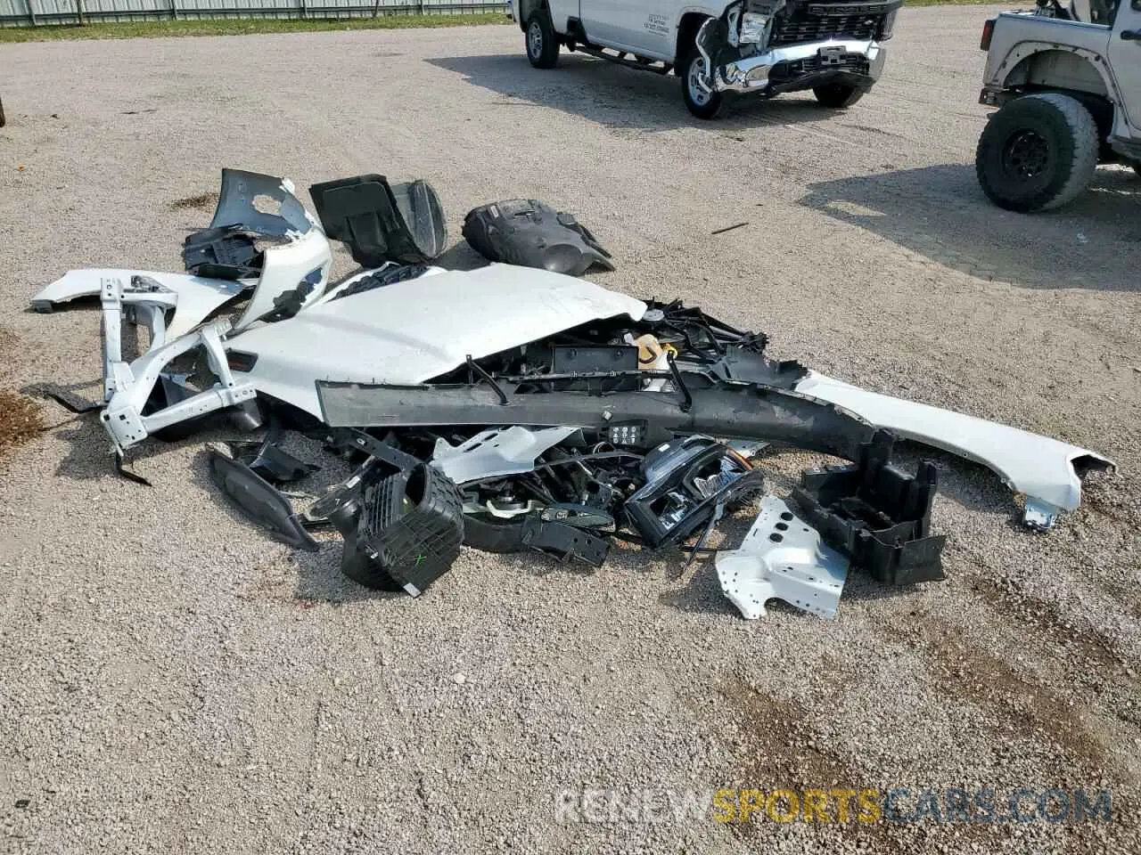 12 Photograph of a damaged car 3C6UR5DJ5RG397499 RAM 2500 2024