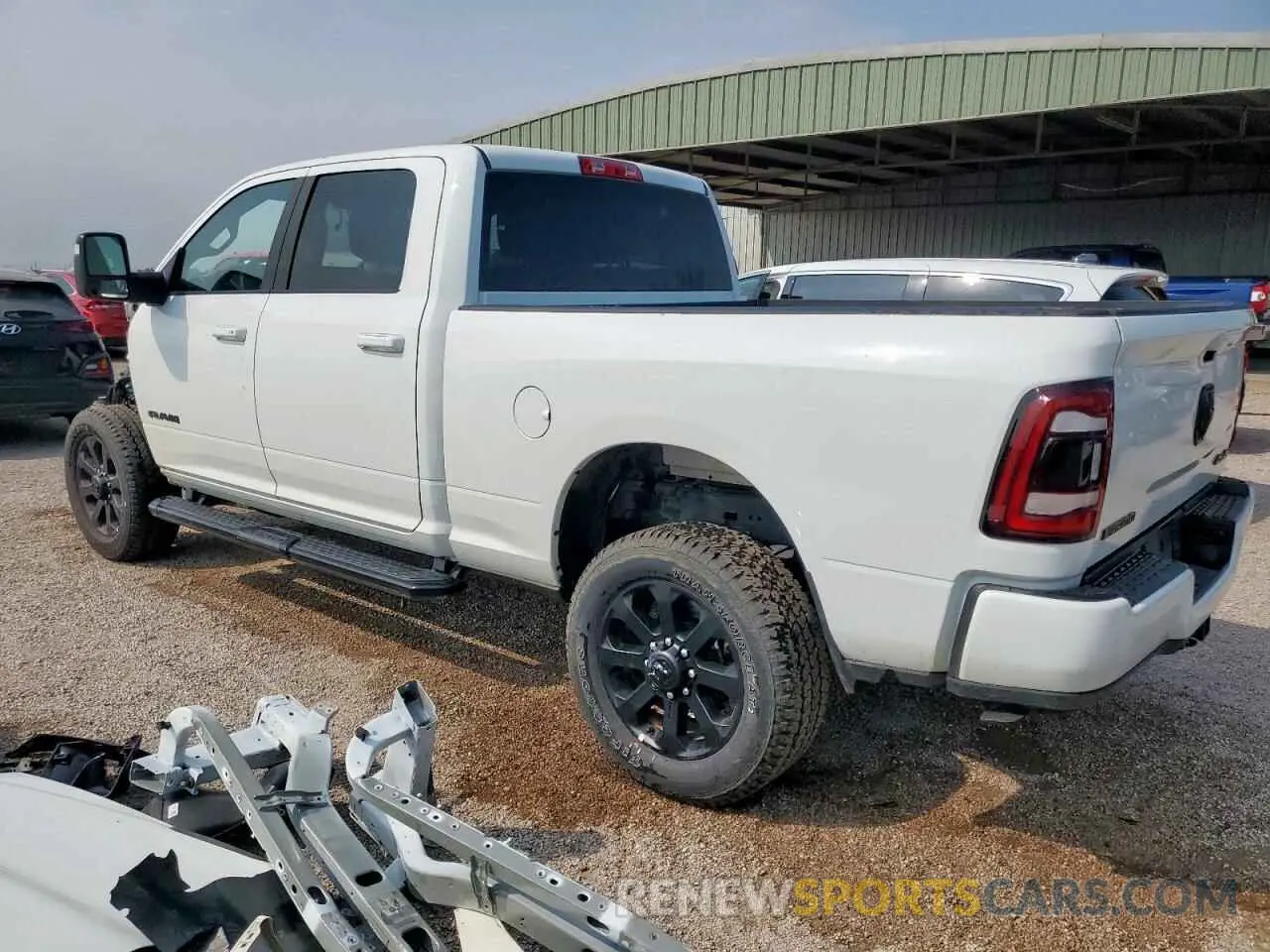 2 Photograph of a damaged car 3C6UR5DJ5RG397499 RAM 2500 2024