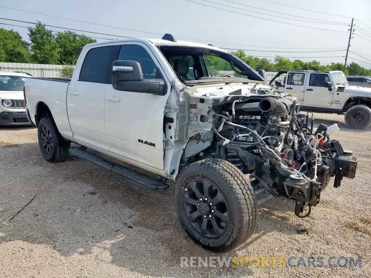 4 Photograph of a damaged car 3C6UR5DJ5RG397499 RAM 2500 2024