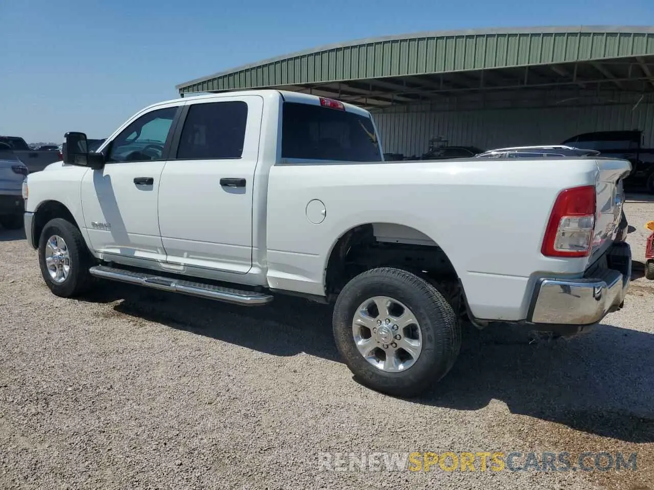 2 Photograph of a damaged car 3C6UR5DJ5RG400028 RAM 2500 2024