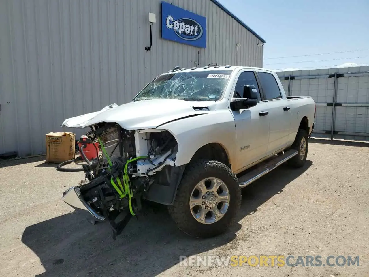 1 Photograph of a damaged car 3C6UR5DJ6RG175800 RAM 2500 2024