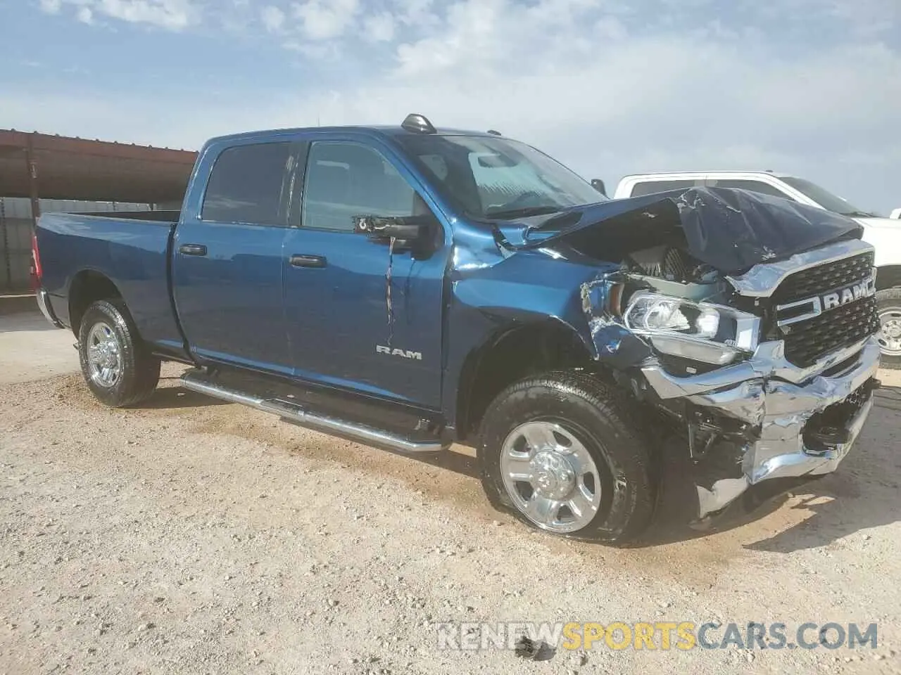 4 Photograph of a damaged car 3C6UR5DJ6RG342933 RAM 2500 2024