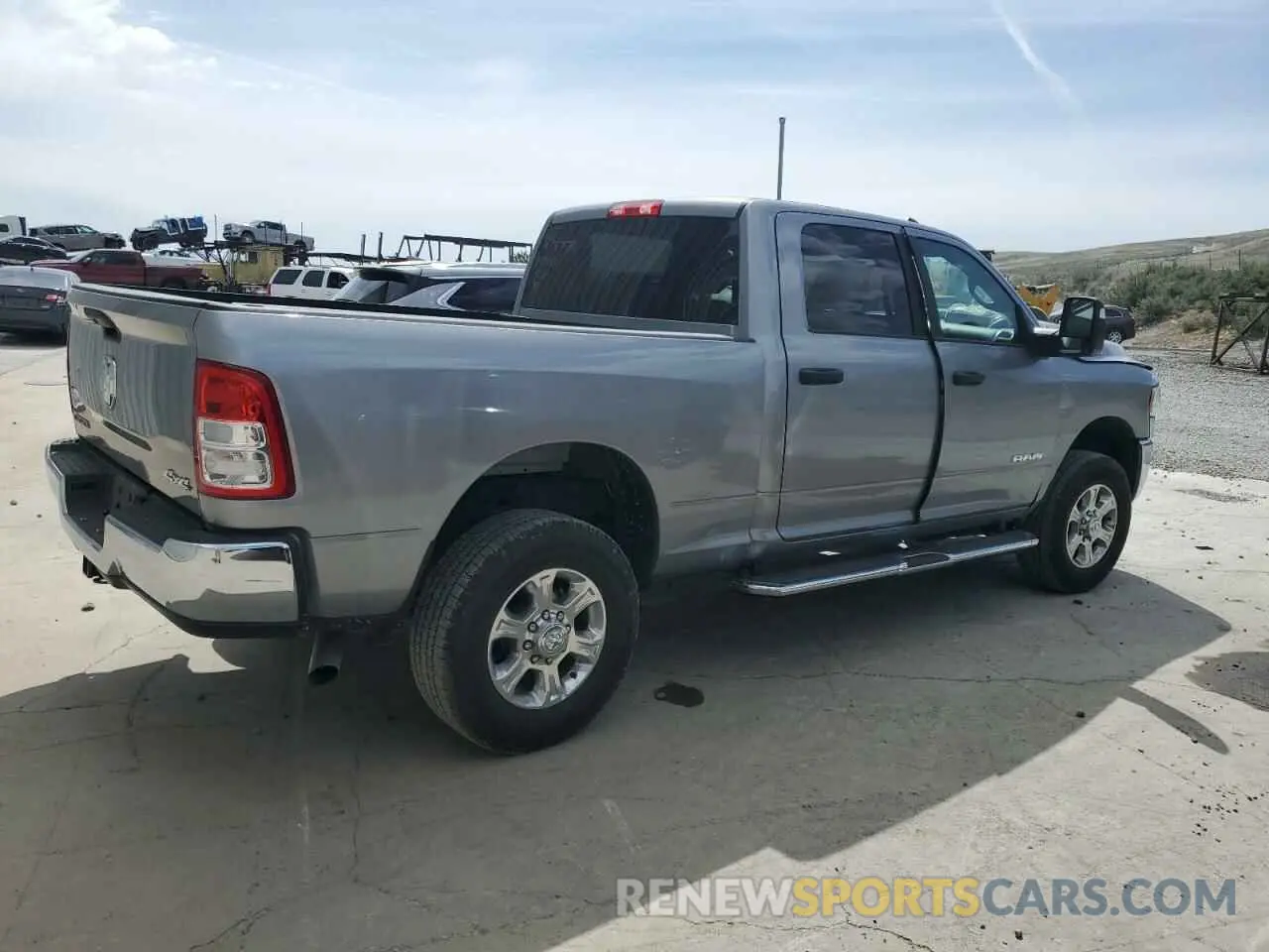 3 Photograph of a damaged car 3C6UR5DJ6RG385894 RAM 2500 2024