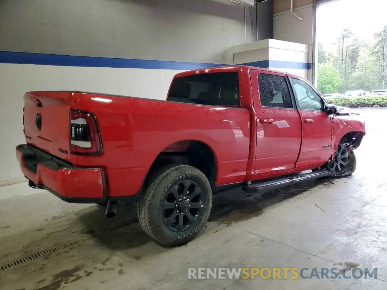 3 Photograph of a damaged car 3C6UR5DJ6RG397057 RAM 2500 2024