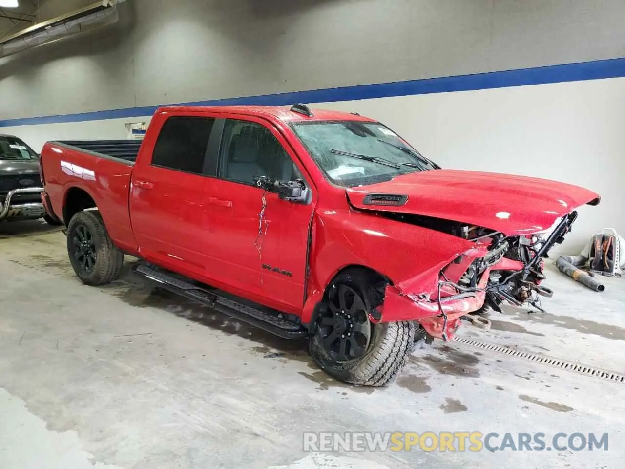 4 Photograph of a damaged car 3C6UR5DJ6RG397057 RAM 2500 2024