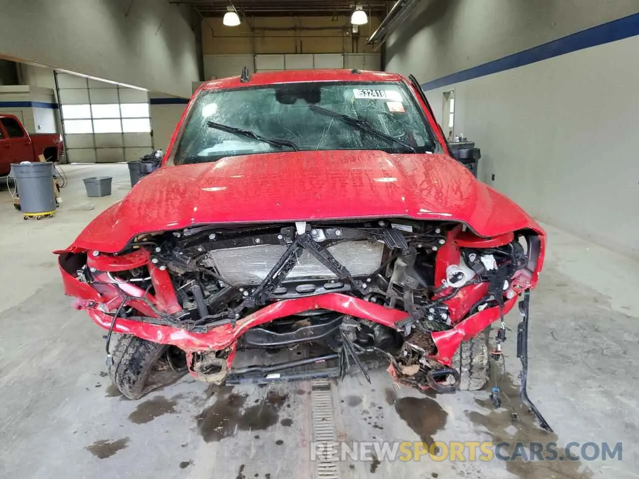 5 Photograph of a damaged car 3C6UR5DJ6RG397057 RAM 2500 2024