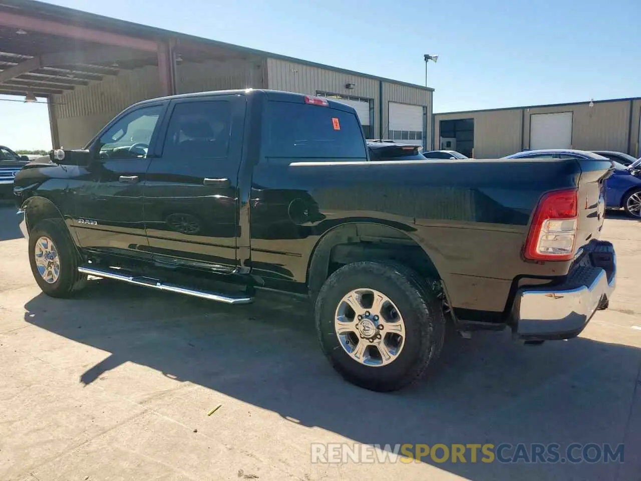 2 Photograph of a damaged car 3C6UR5DJ7RG322626 RAM 2500 2024