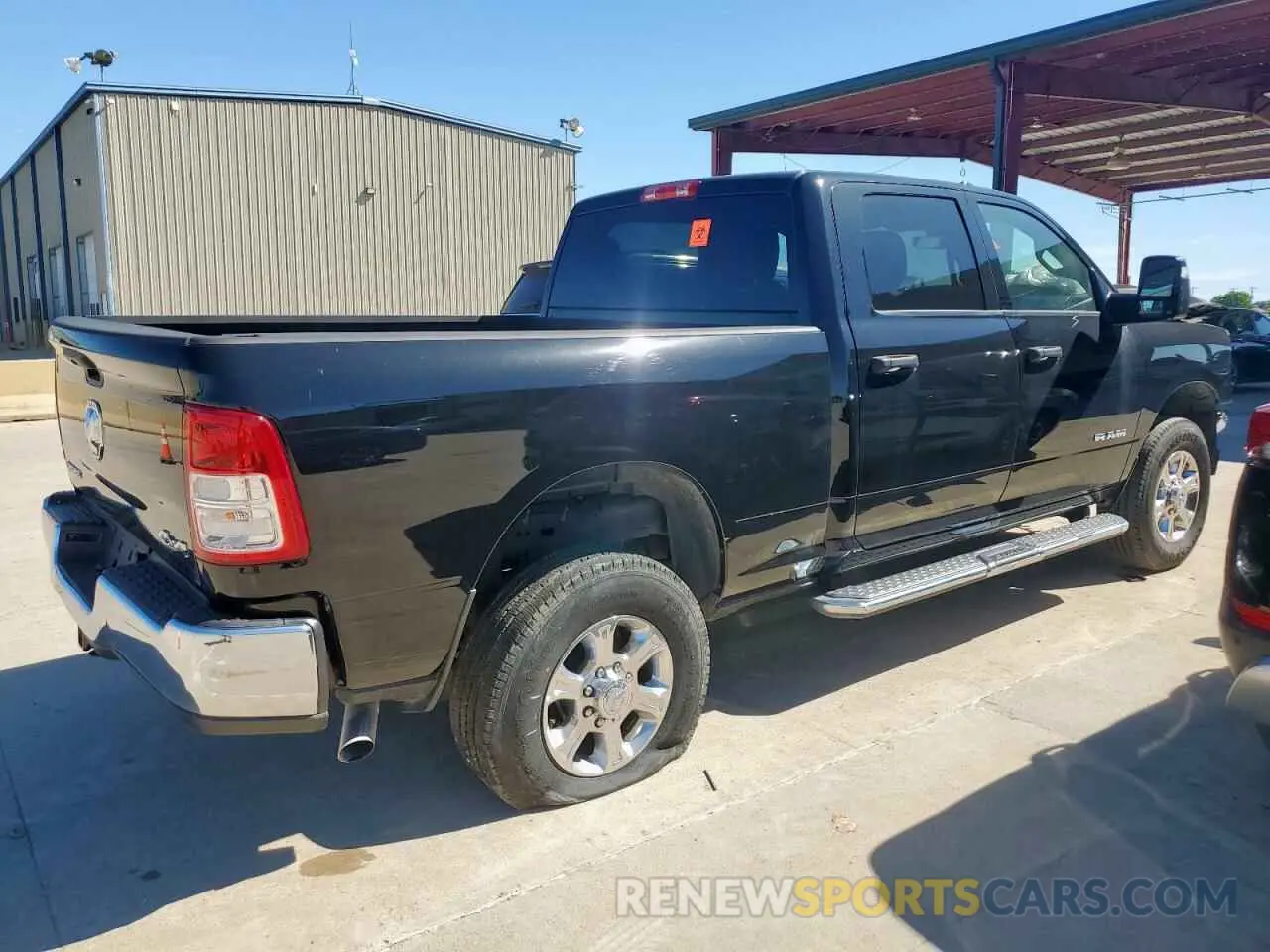 3 Photograph of a damaged car 3C6UR5DJ7RG322626 RAM 2500 2024