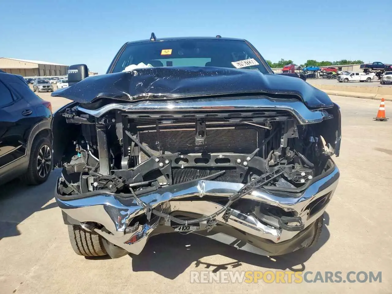 5 Photograph of a damaged car 3C6UR5DJ7RG322626 RAM 2500 2024