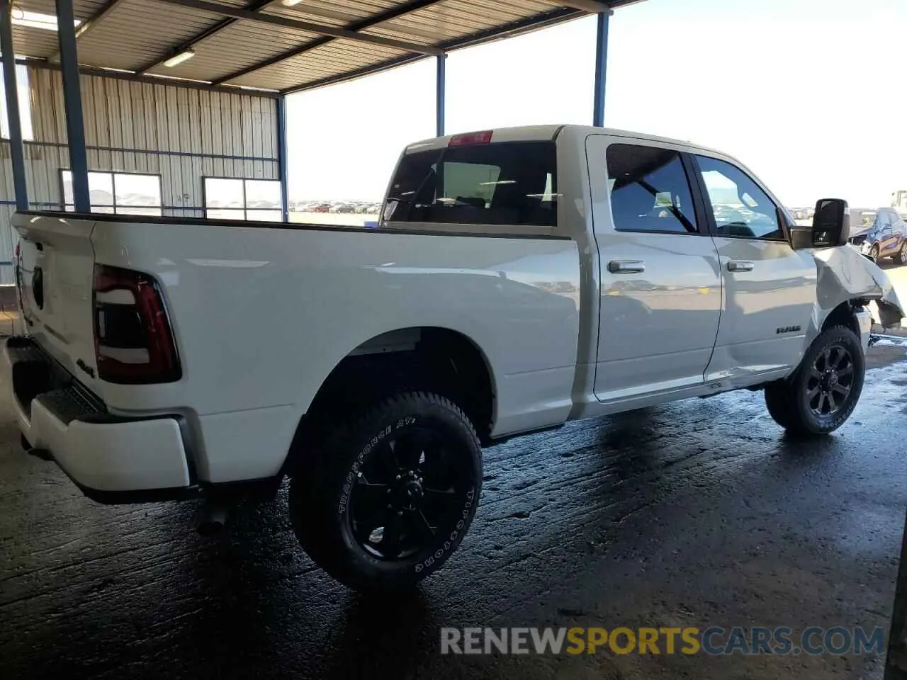 3 Photograph of a damaged car 3C6UR5DJ7RG394359 RAM 2500 2024