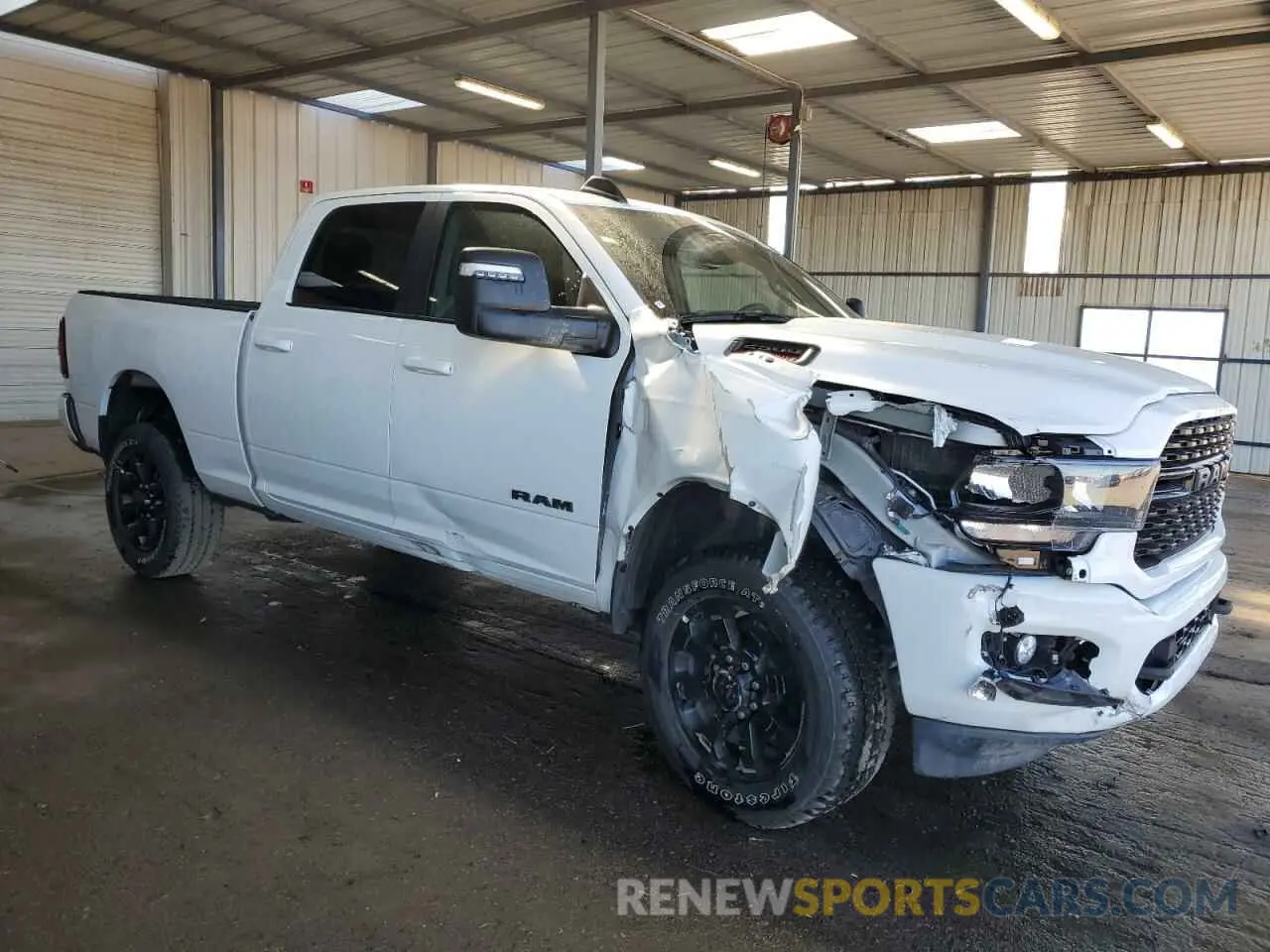 4 Photograph of a damaged car 3C6UR5DJ7RG394359 RAM 2500 2024
