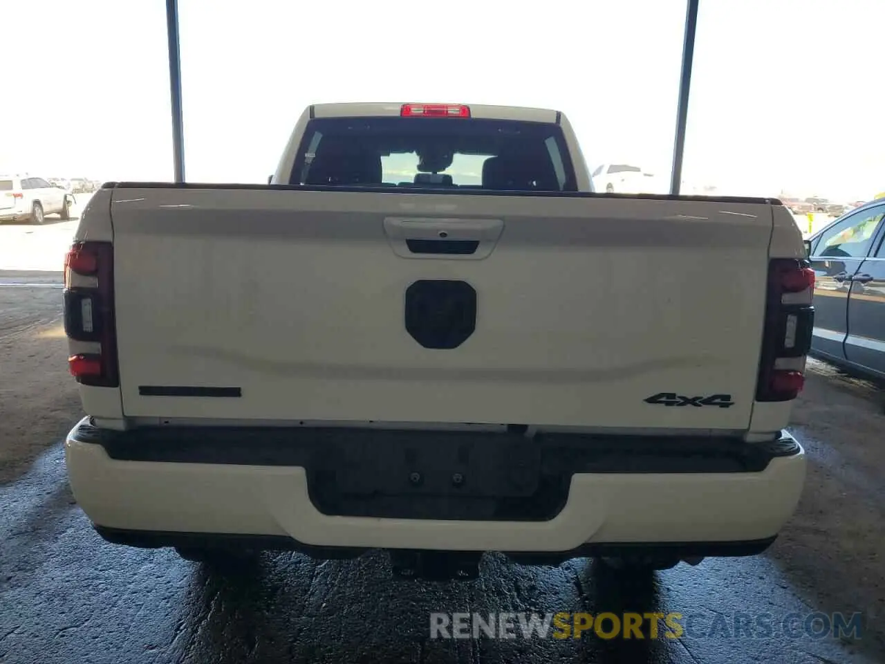 6 Photograph of a damaged car 3C6UR5DJ7RG394359 RAM 2500 2024