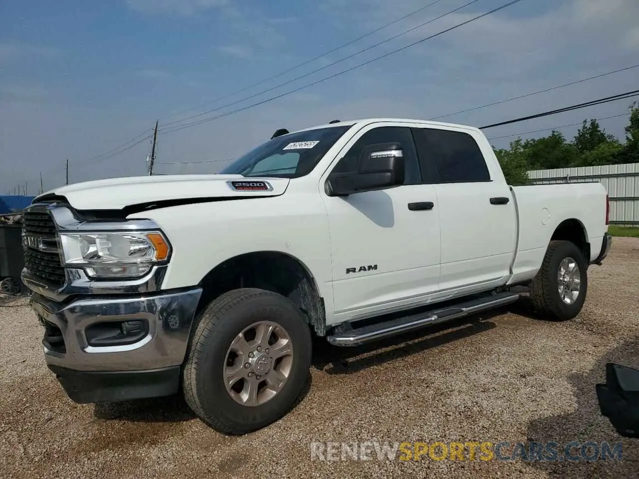 1 Photograph of a damaged car 3C6UR5DJ7RG412973 RAM 2500 2024