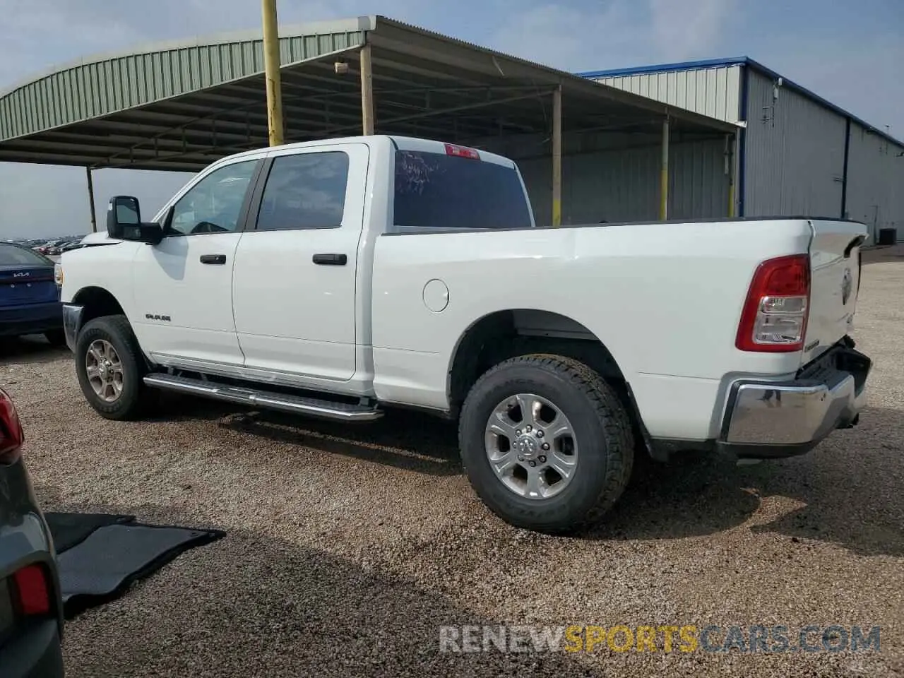2 Photograph of a damaged car 3C6UR5DJ7RG412973 RAM 2500 2024