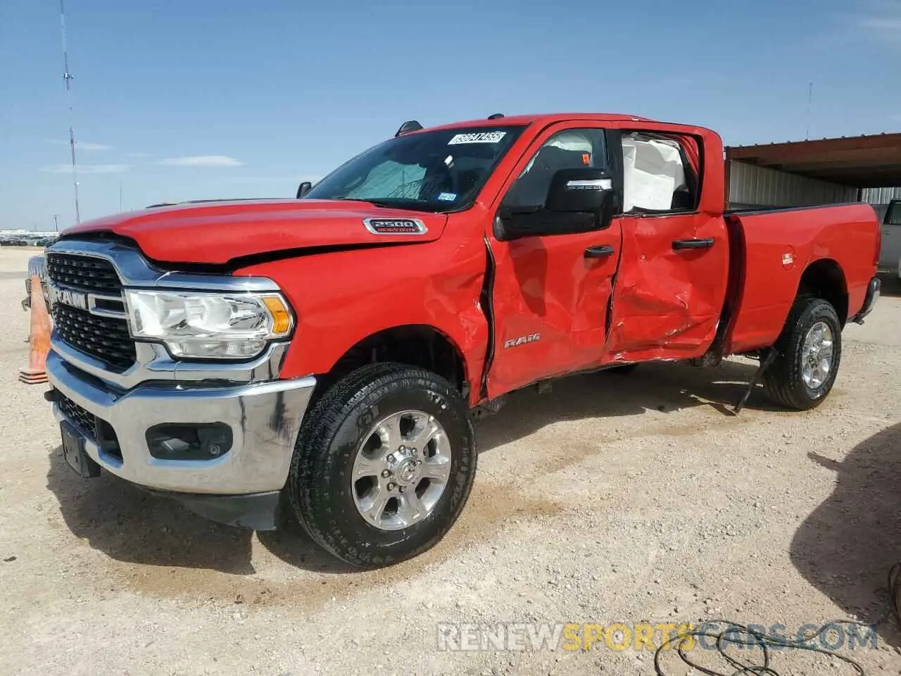 1 Photograph of a damaged car 3C6UR5DJ8RG381040 RAM 2500 2024